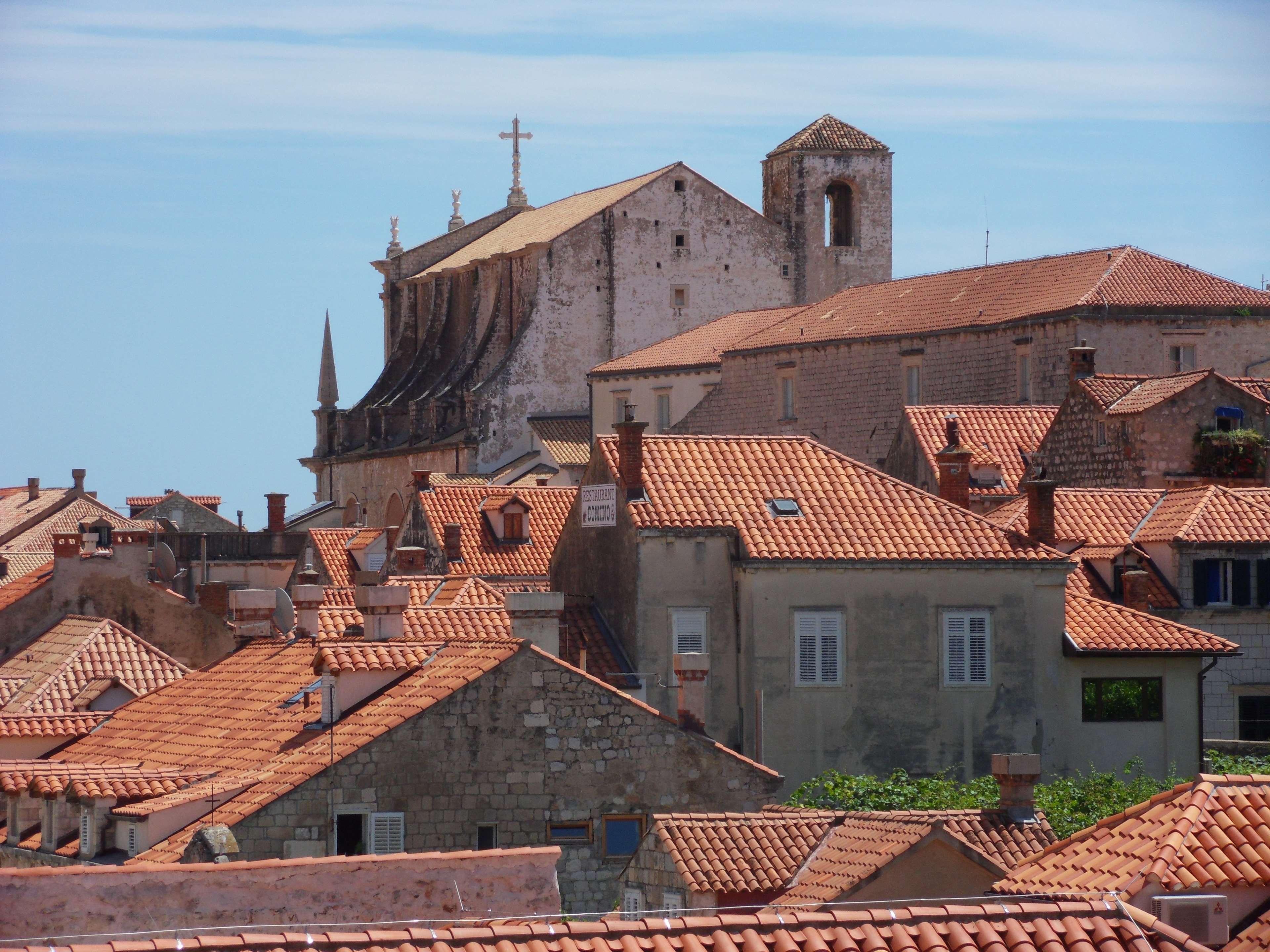 Dubrovnik cityscape with church and tiled roofs HD Wallpaper