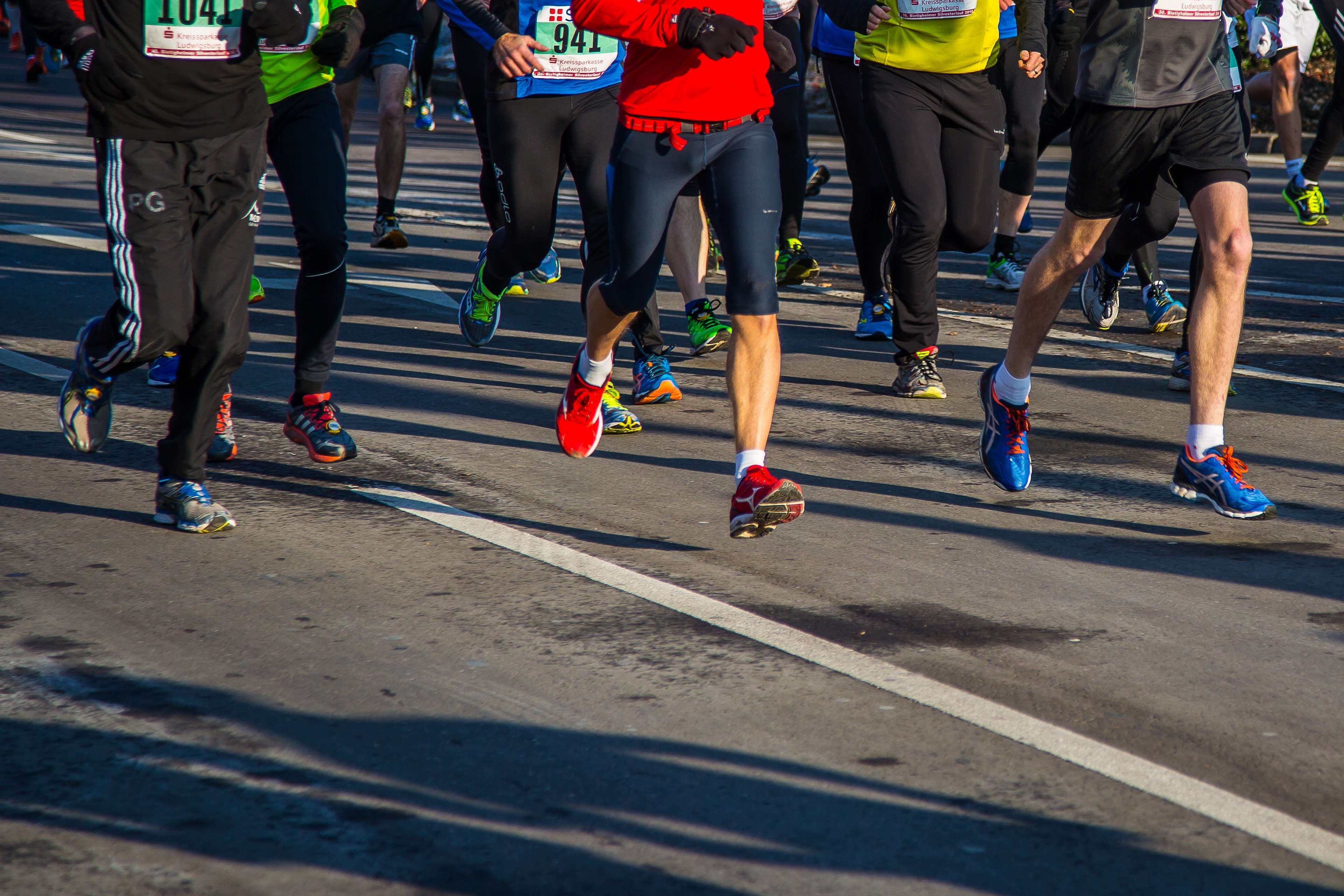 Runners in a race HD Wallpaper