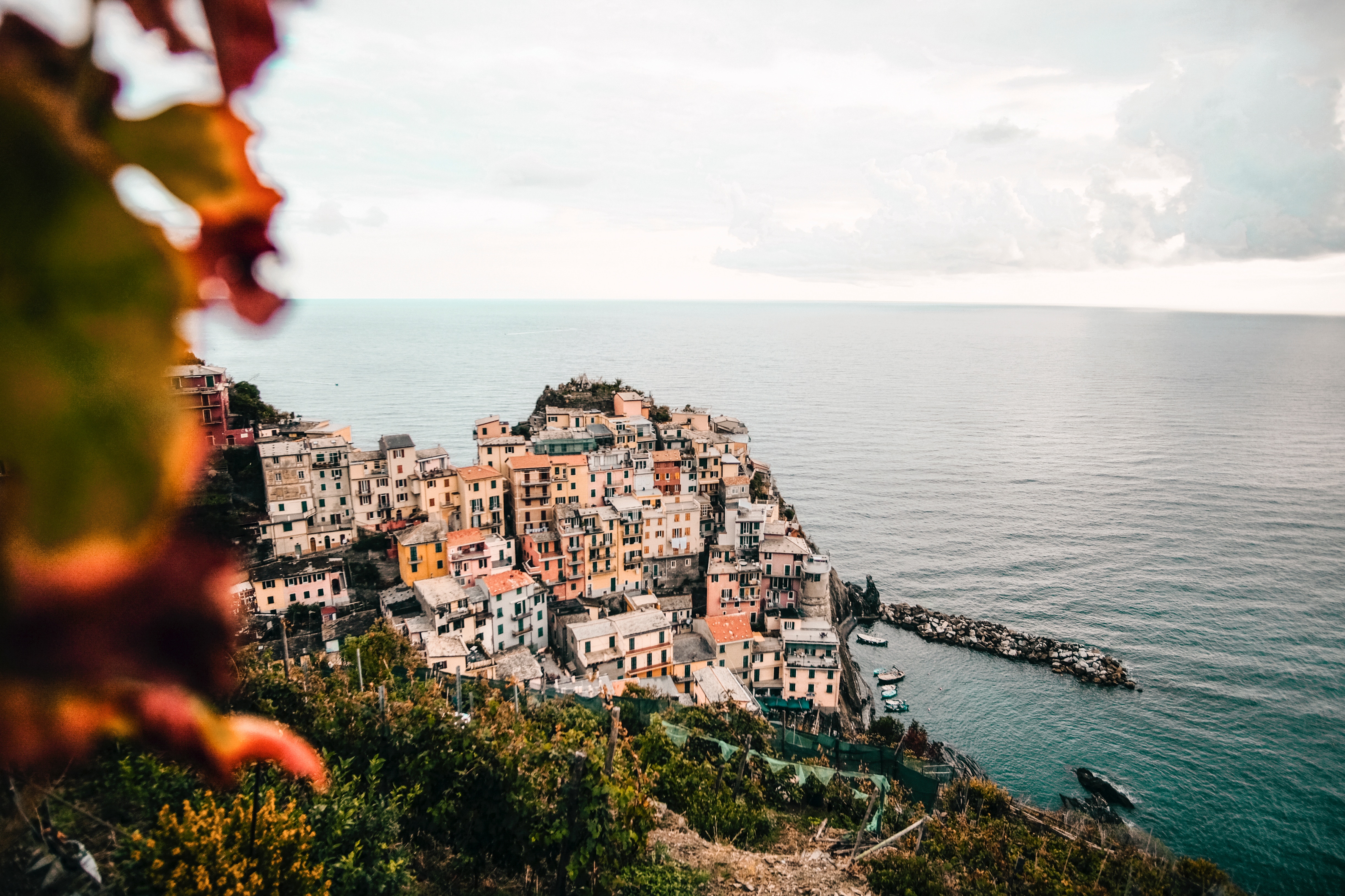 Colorful village on a cliff overlooking the sea HD Wallpaper