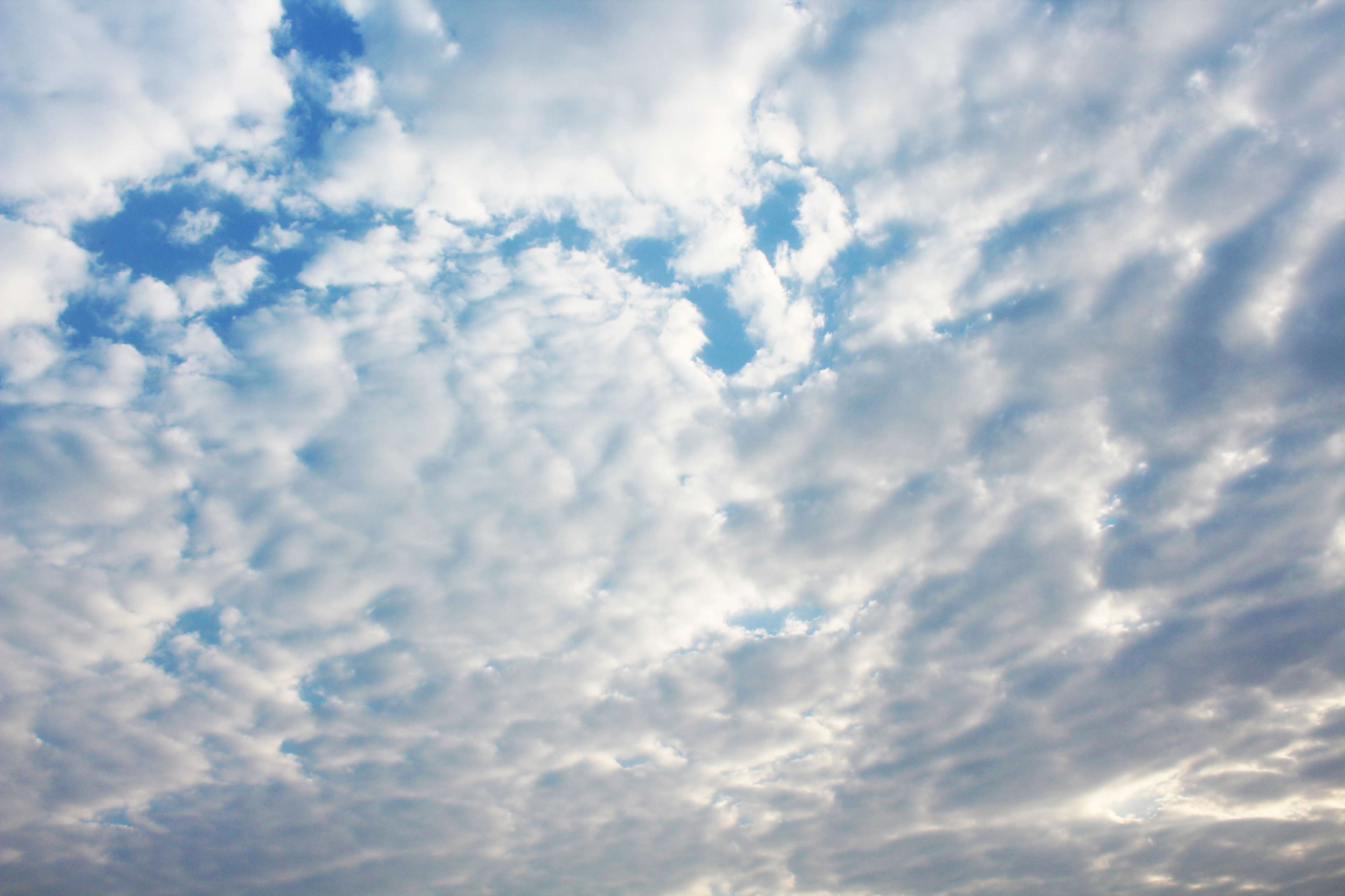 Blue sky with white and gray clouds 4K HD Wallpaper