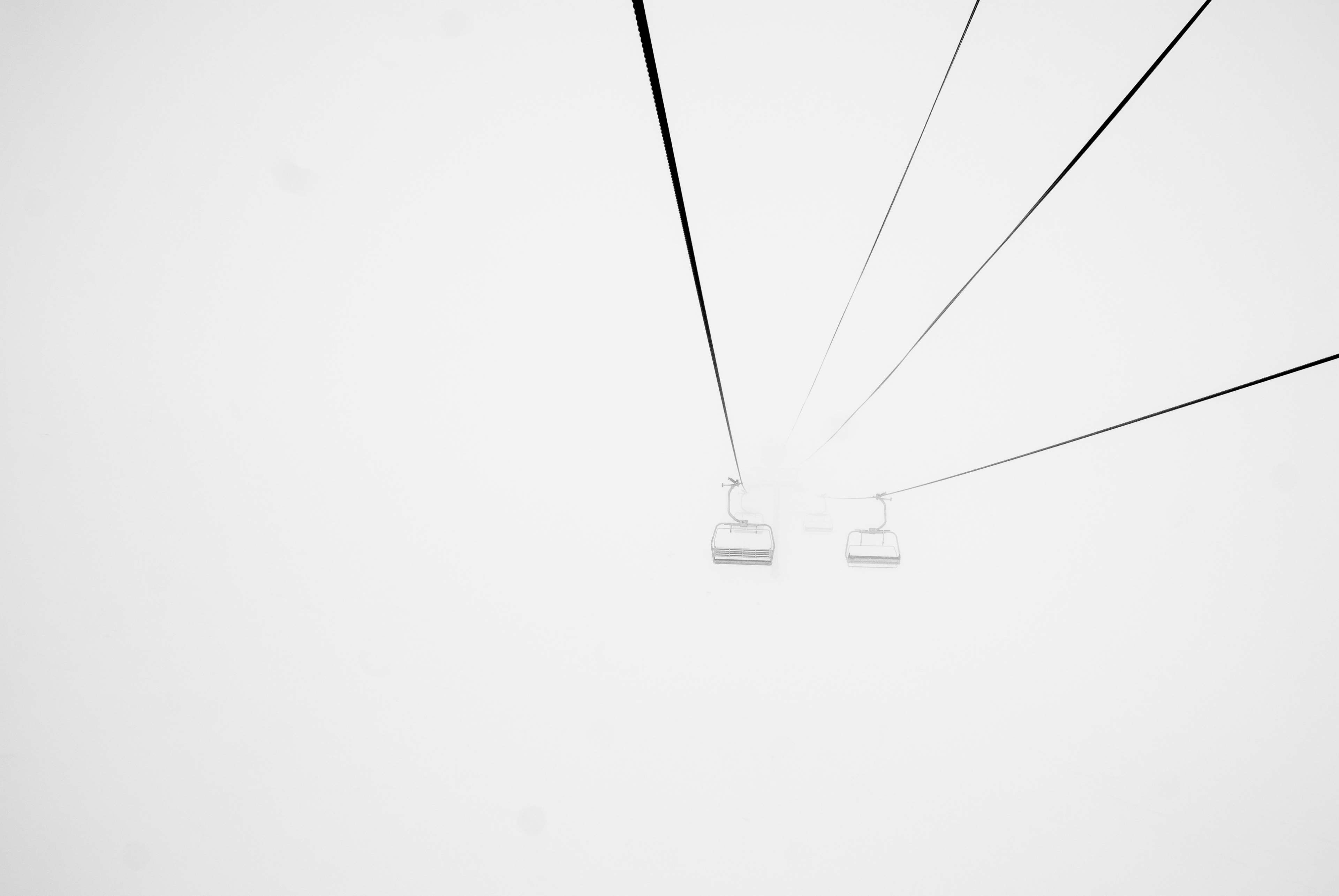 Ski lift in fog HD Wallpaper