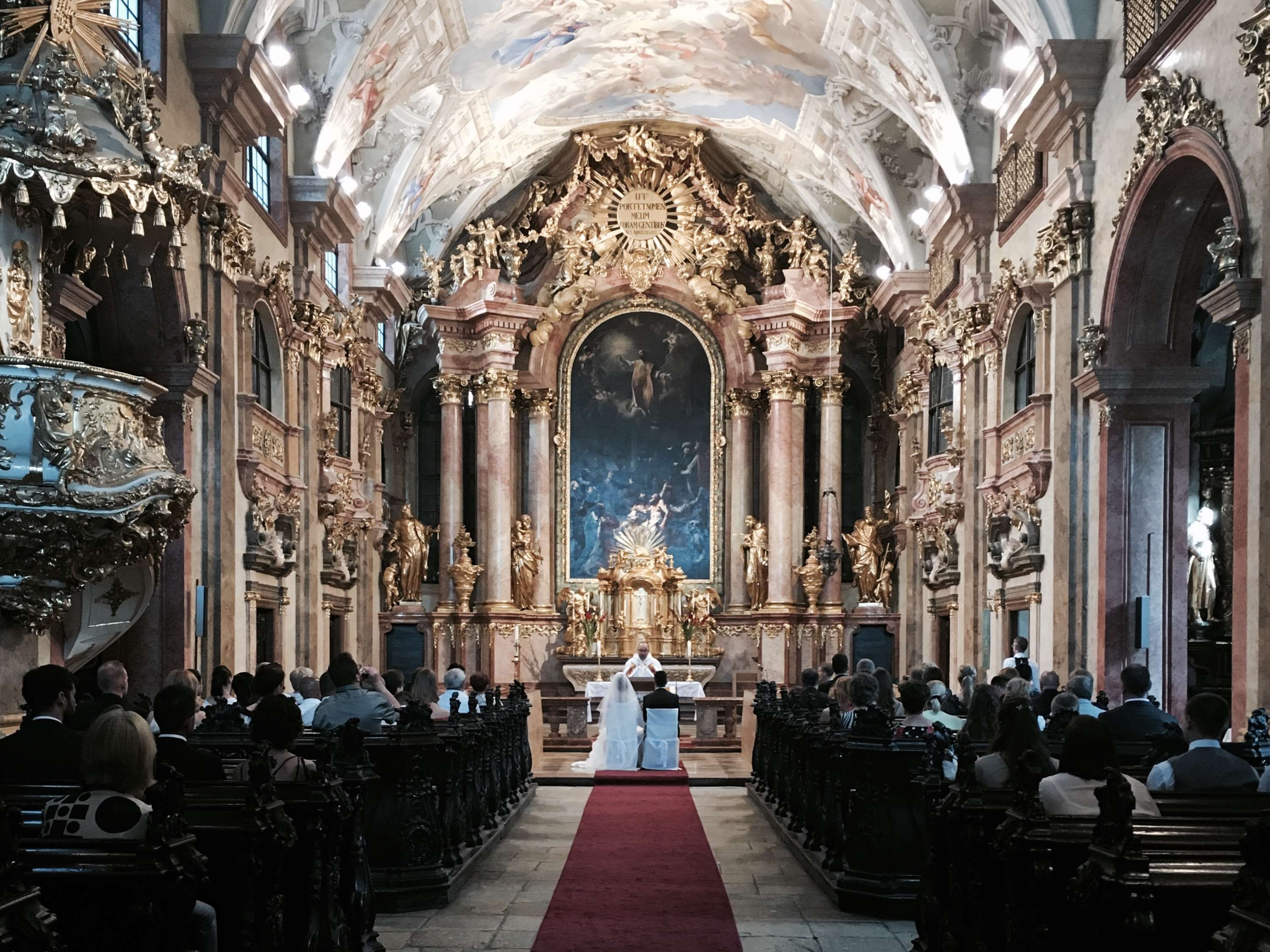 Wedding ceremony in a richly decorated church HD Wallpaper