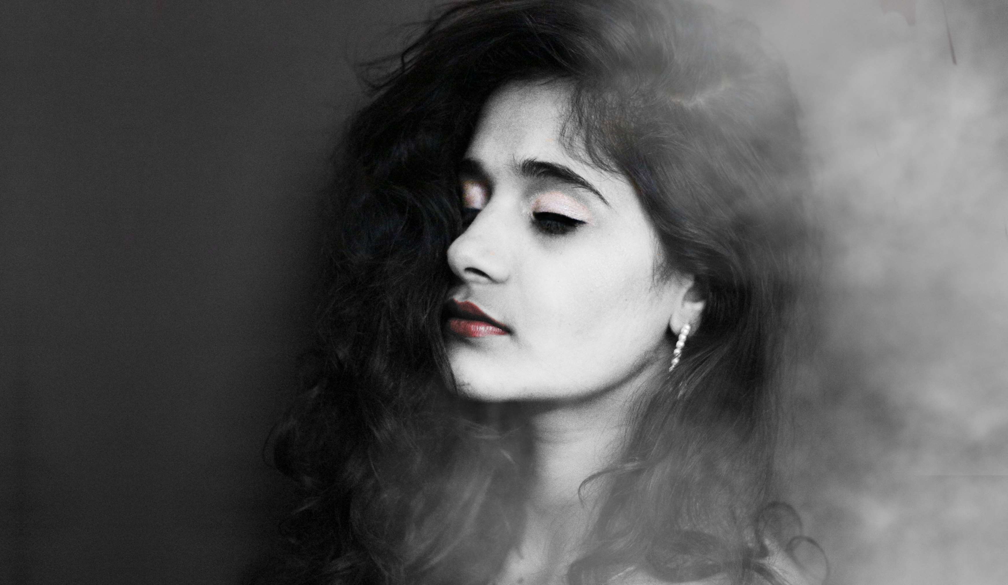 Woman with dark hair and smoke HD Wallpaper