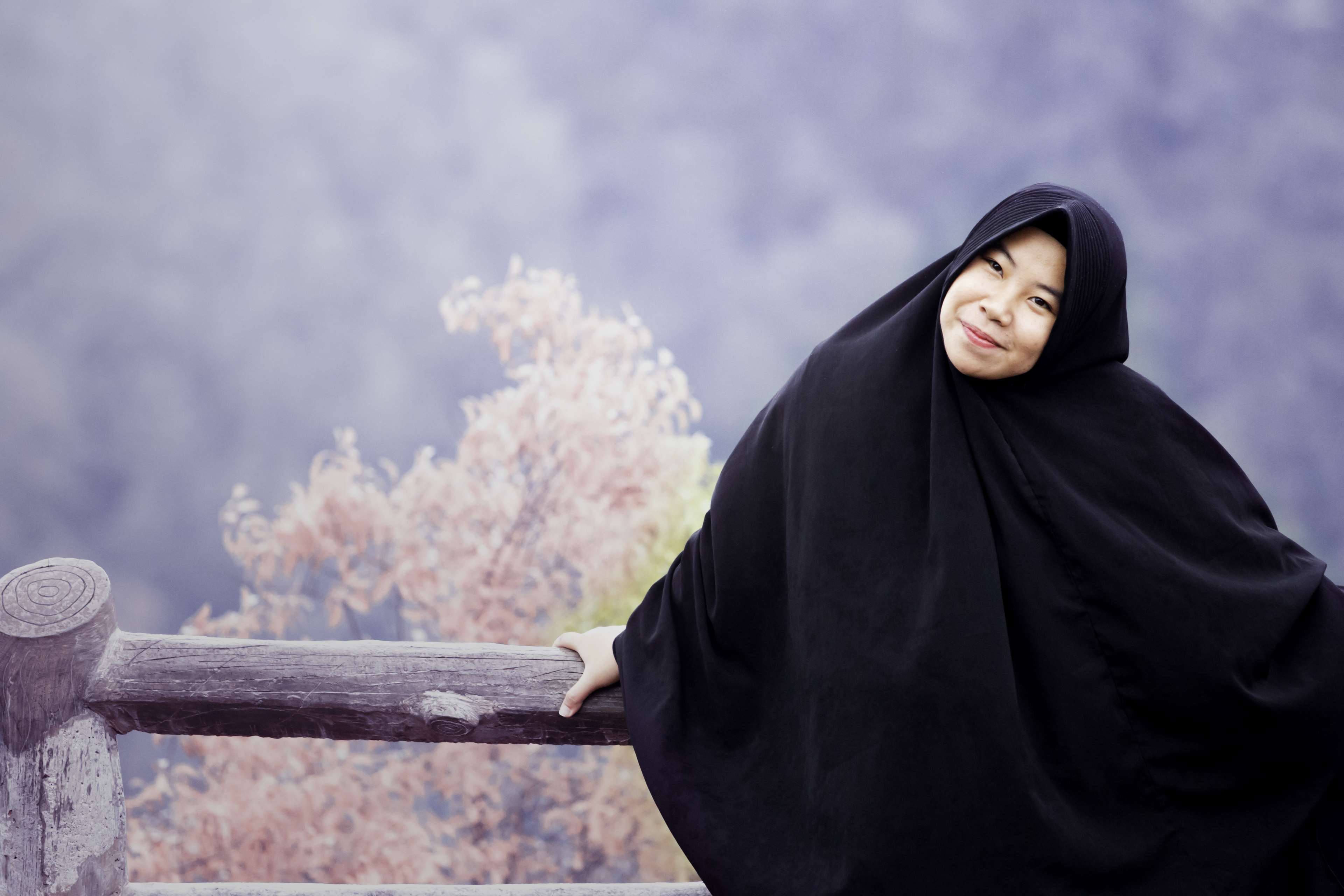 Woman in Hijab Smiling Outdoors HD Wallpaper