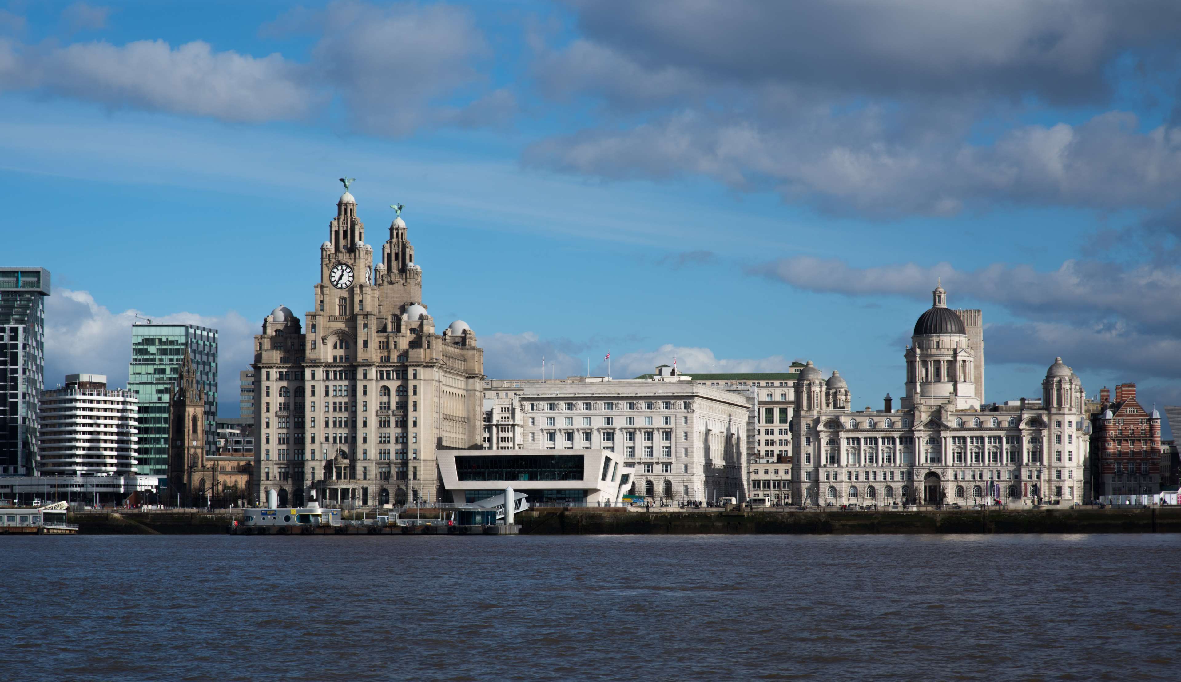 Liverpool waterfront skyline with historic buildings and modern architecture HD Wallpaper