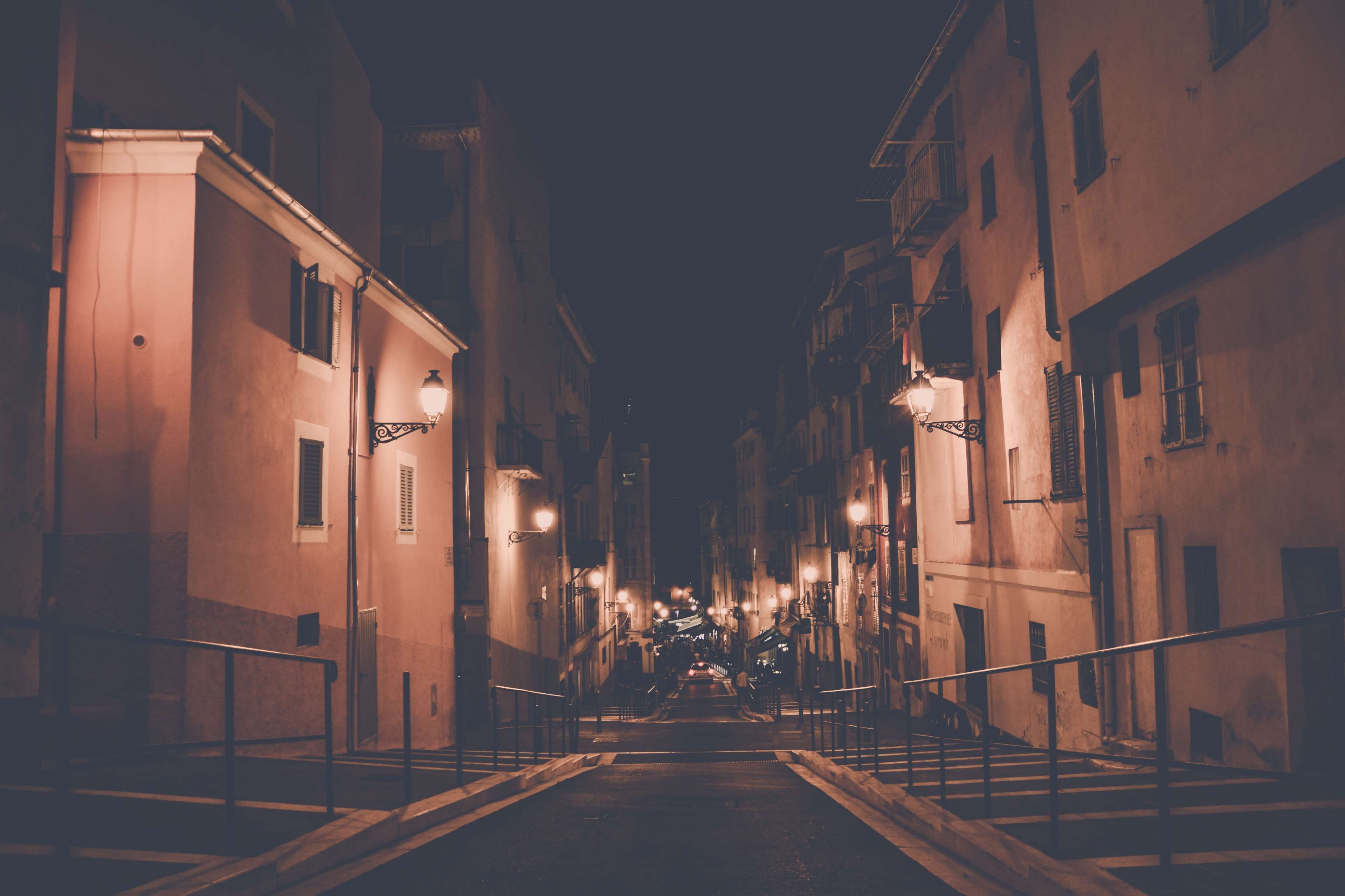 Night street with buildings and streetlights HD Wallpaper