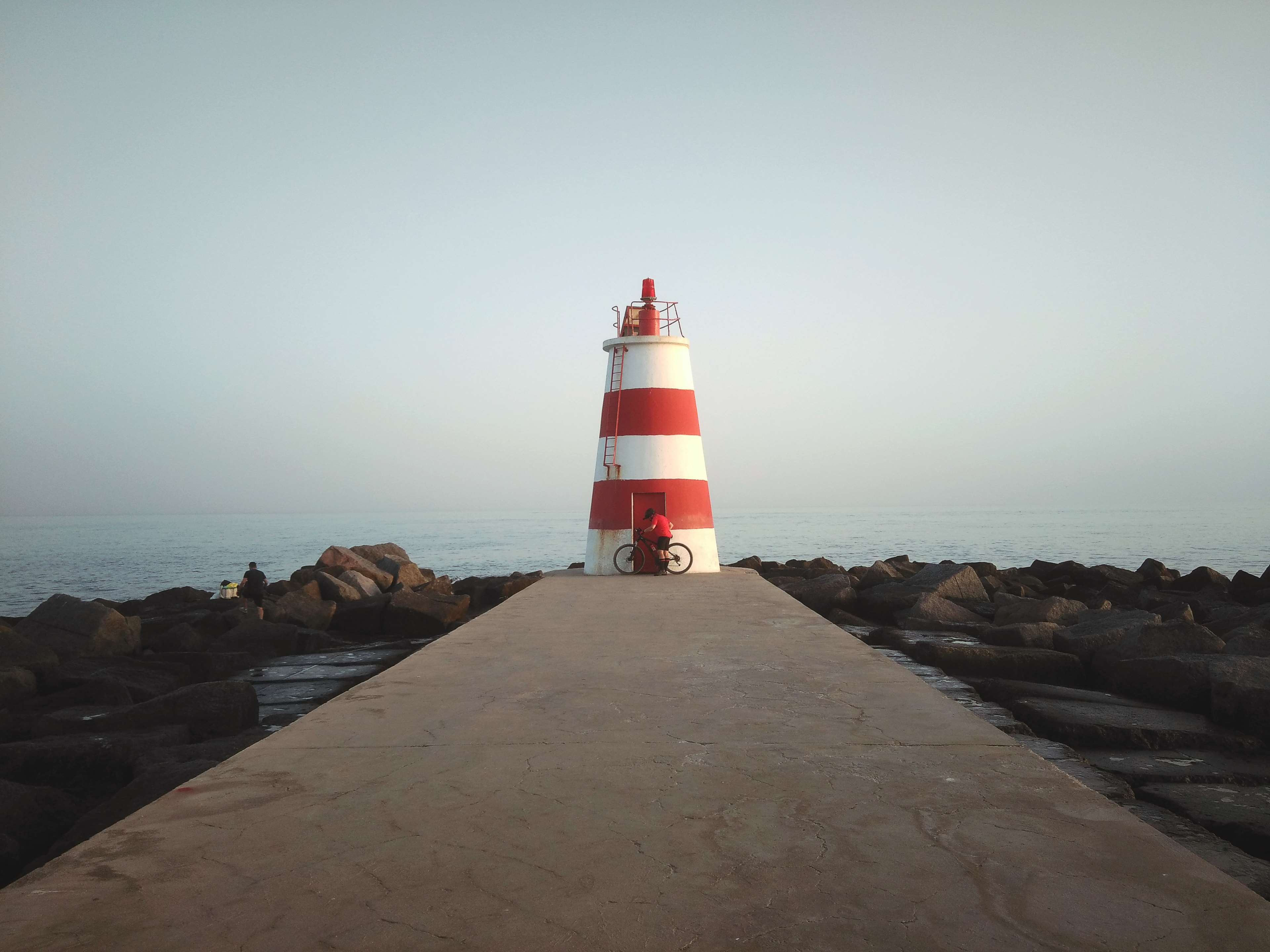 Lighthouse on a pier in Algarve, Portugal 4K HD Wallpaper
