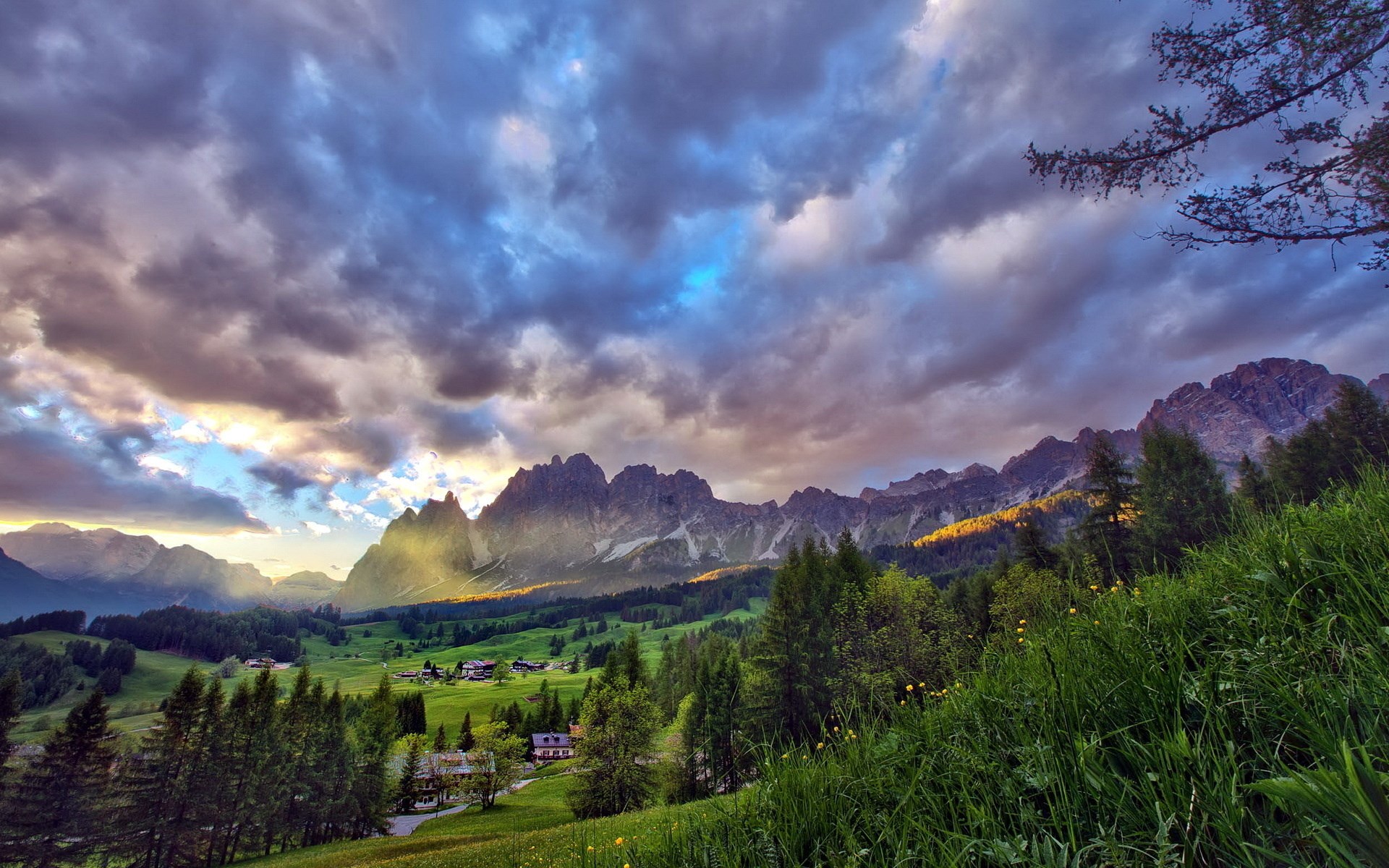 Mountain valley with dramatic clouds at sunset HD Wallpaper