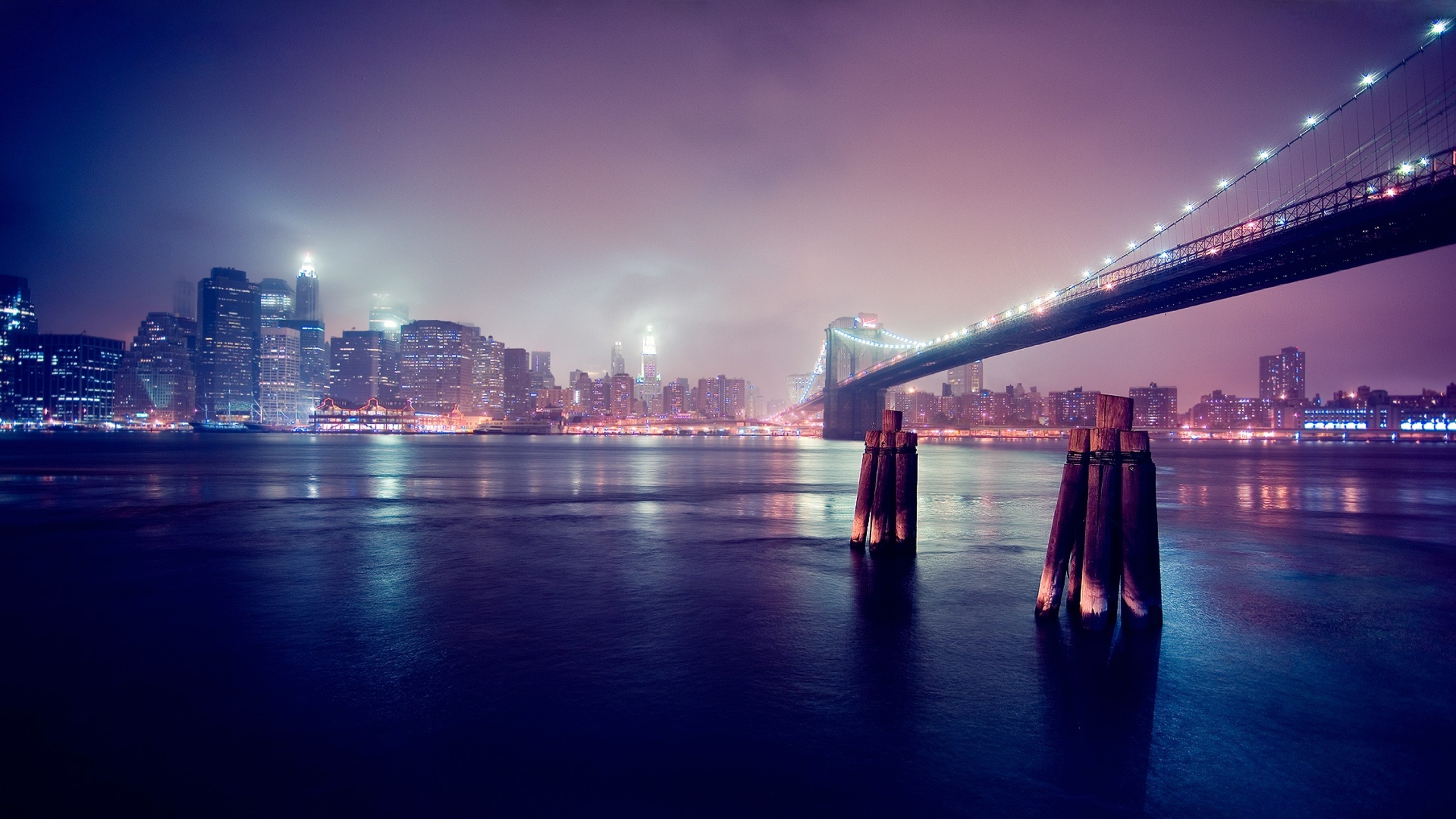 New York City Skyline and Brooklyn Bridge at Night HD Wallpaper