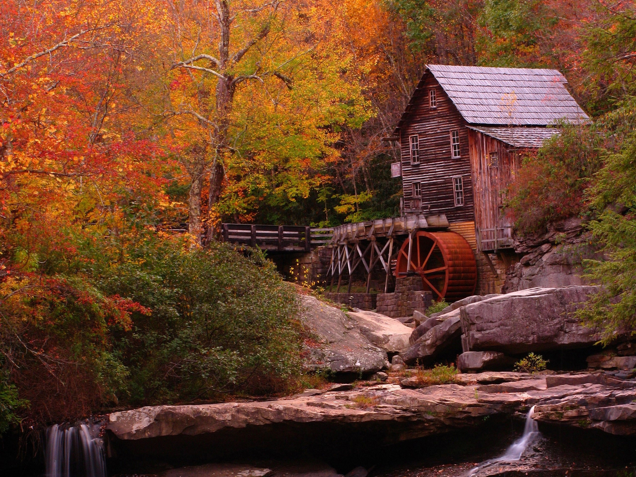 Old wooden mill with water wheel in autumn forest HD Wallpaper
