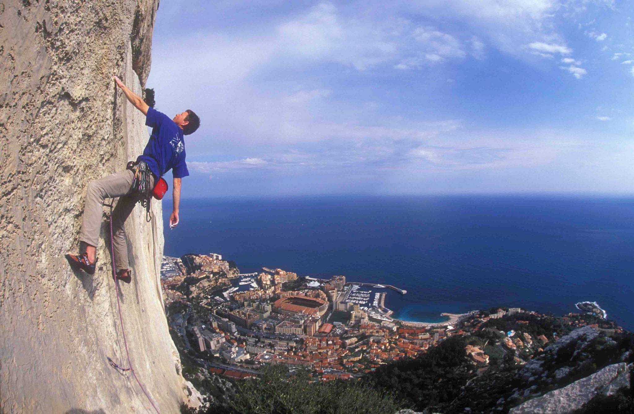Rock climber overlooking Monaco HD Wallpaper