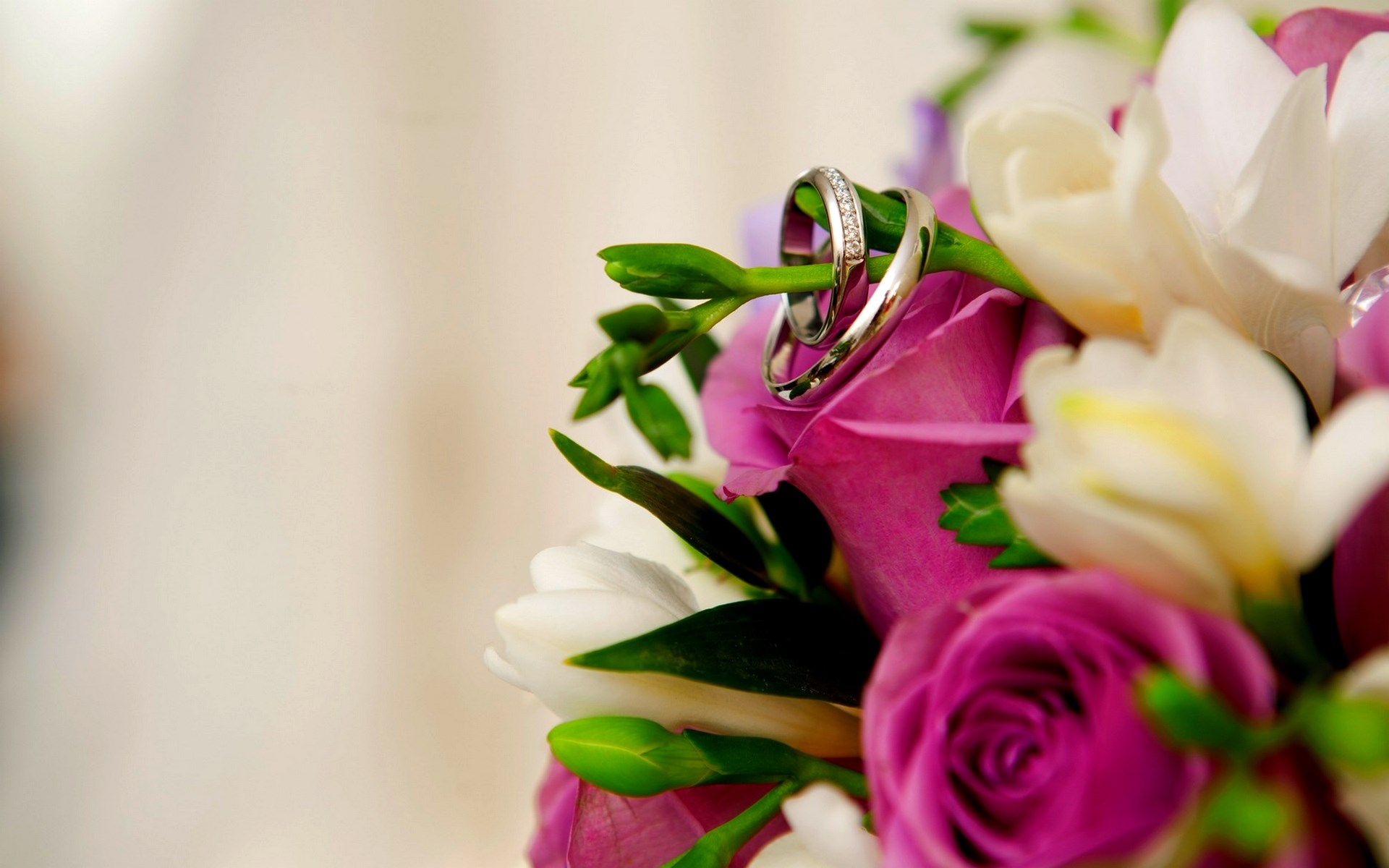Wedding Rings on a Floral Bouquet HD Wallpaper