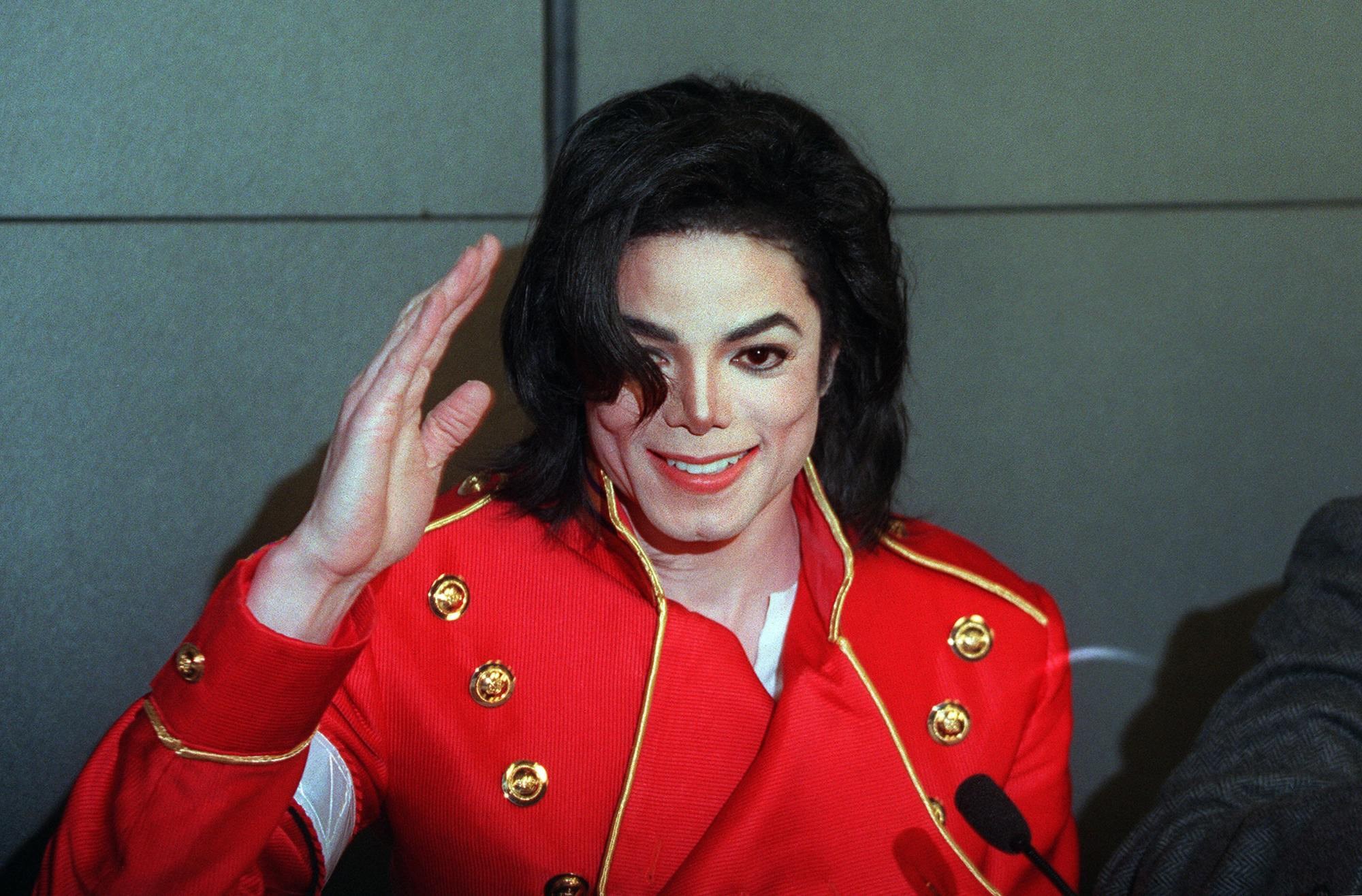 Michael Jackson wearing a red military-style jacket HD Wallpaper