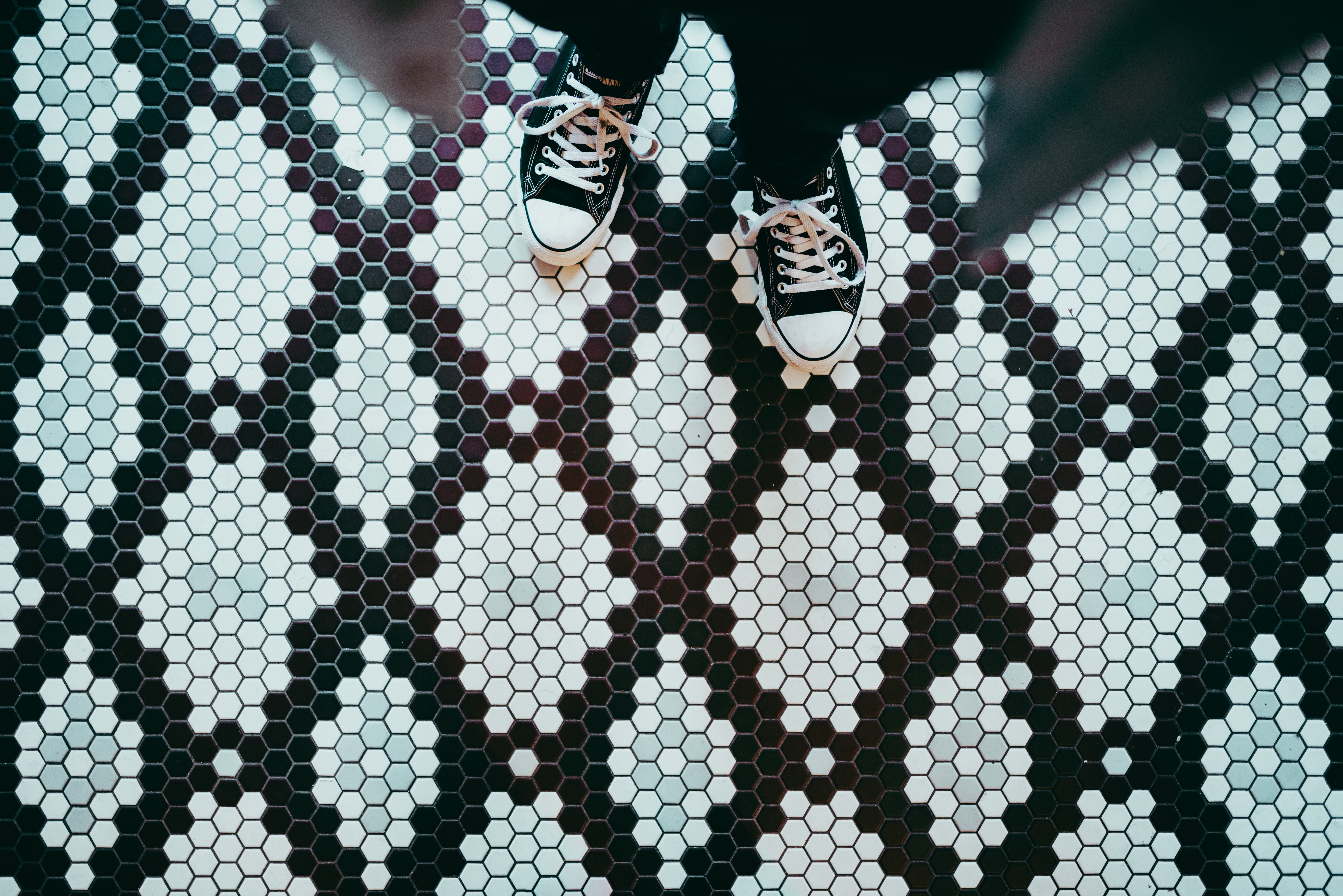 Black and white hexagonal tile pattern with shoes HD Wallpaper