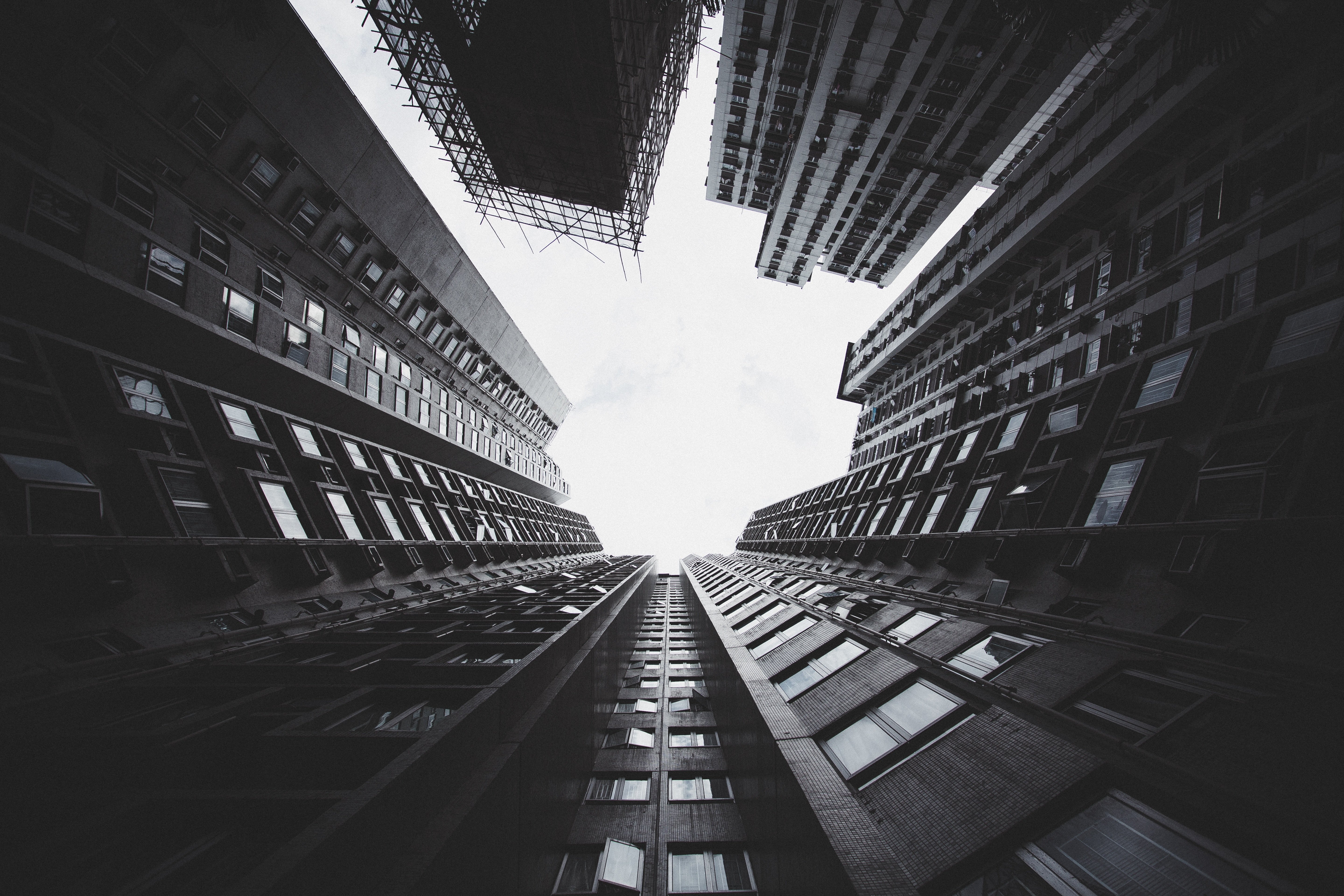 Looking up at Hong Kong skyscrapers with scaffolding HD Wallpaper