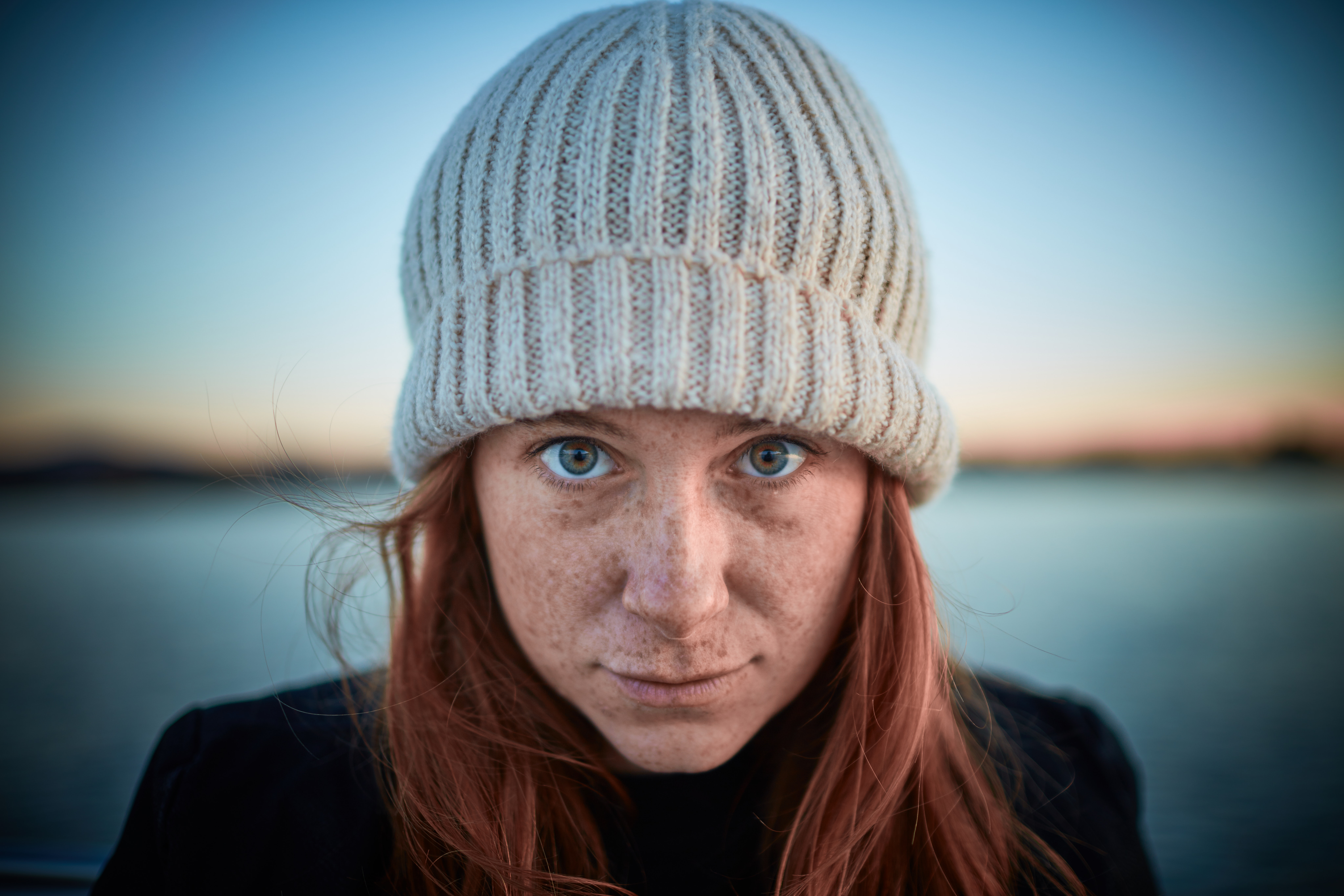 Woman with red hair and freckles wearing a beanie HD Wallpaper