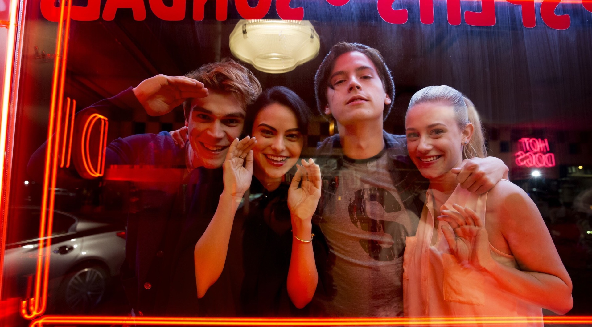 Four Friends Smiling Through Riverdale Diner Window HD Wallpaper