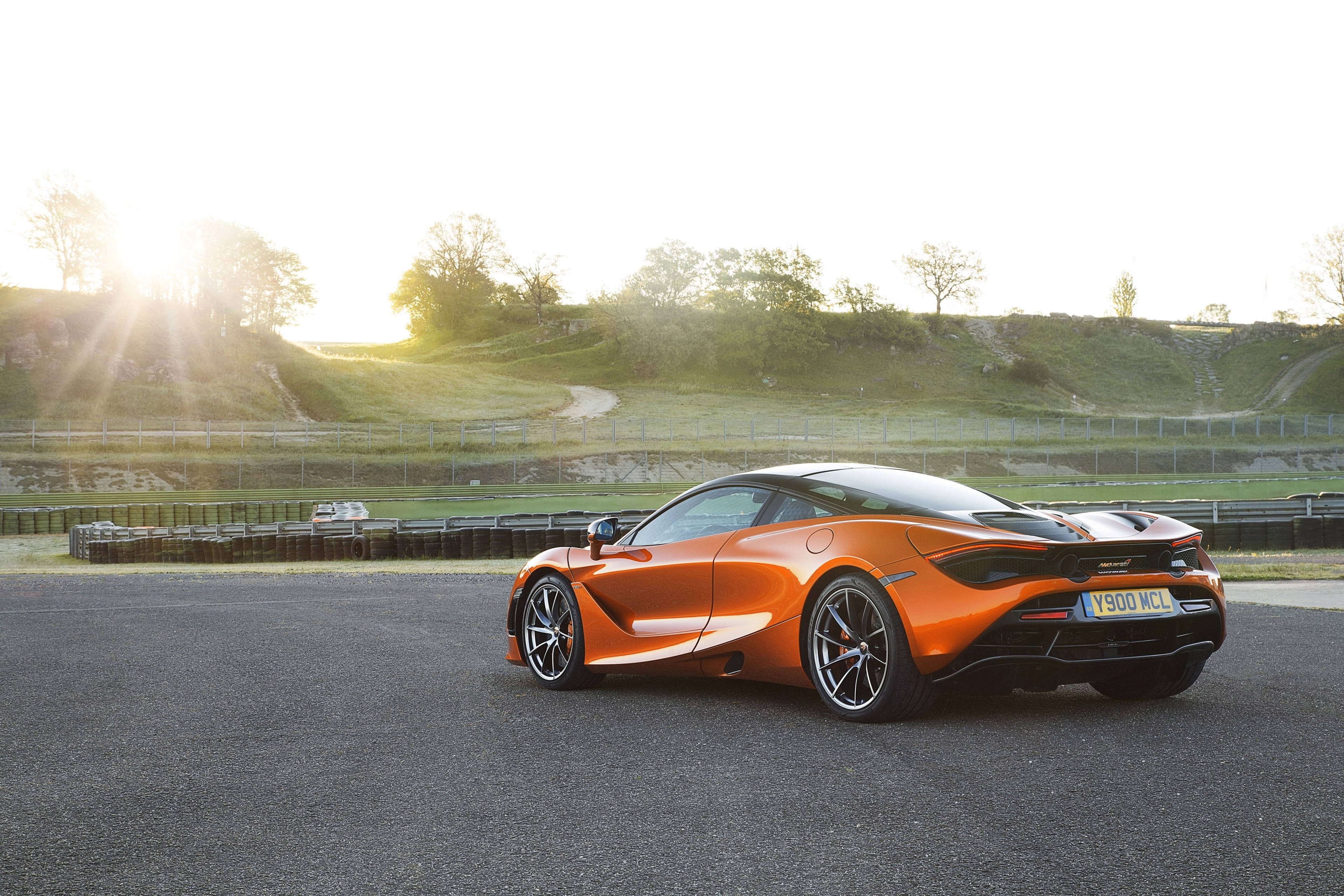 McLaren 720S on a race track HD Wallpaper