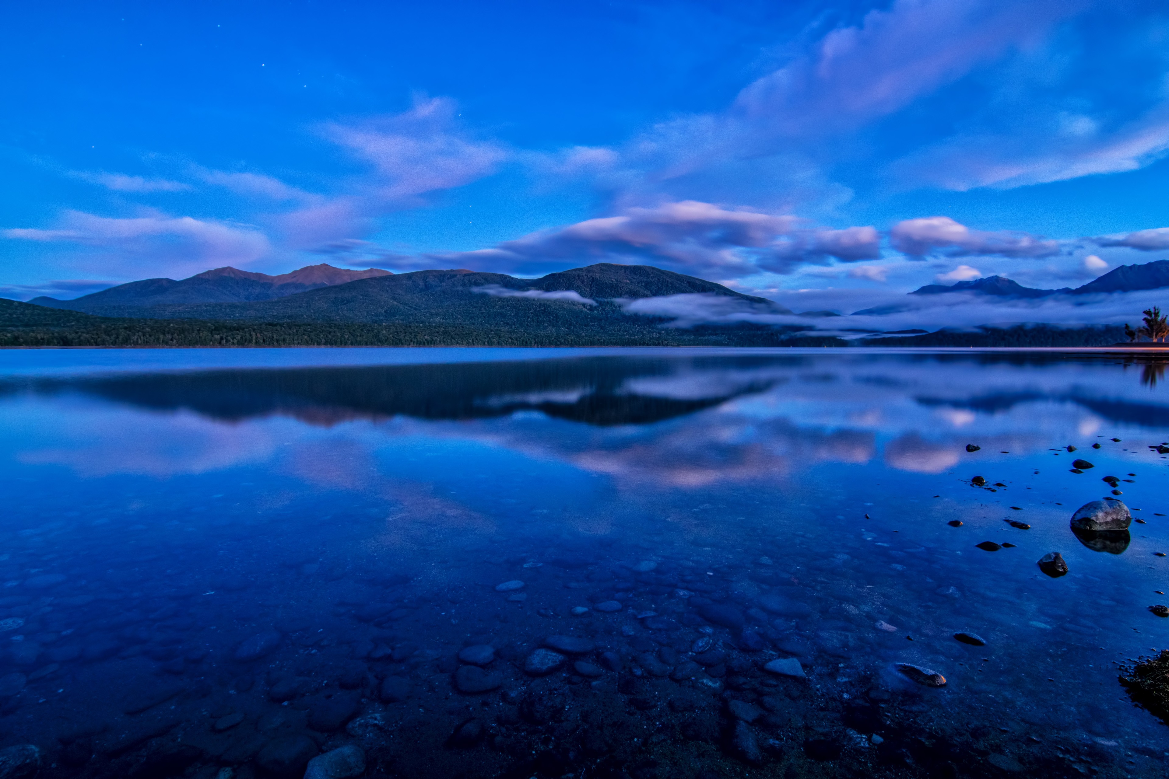 Lake and mountains at twilight with reflections HD Wallpaper
