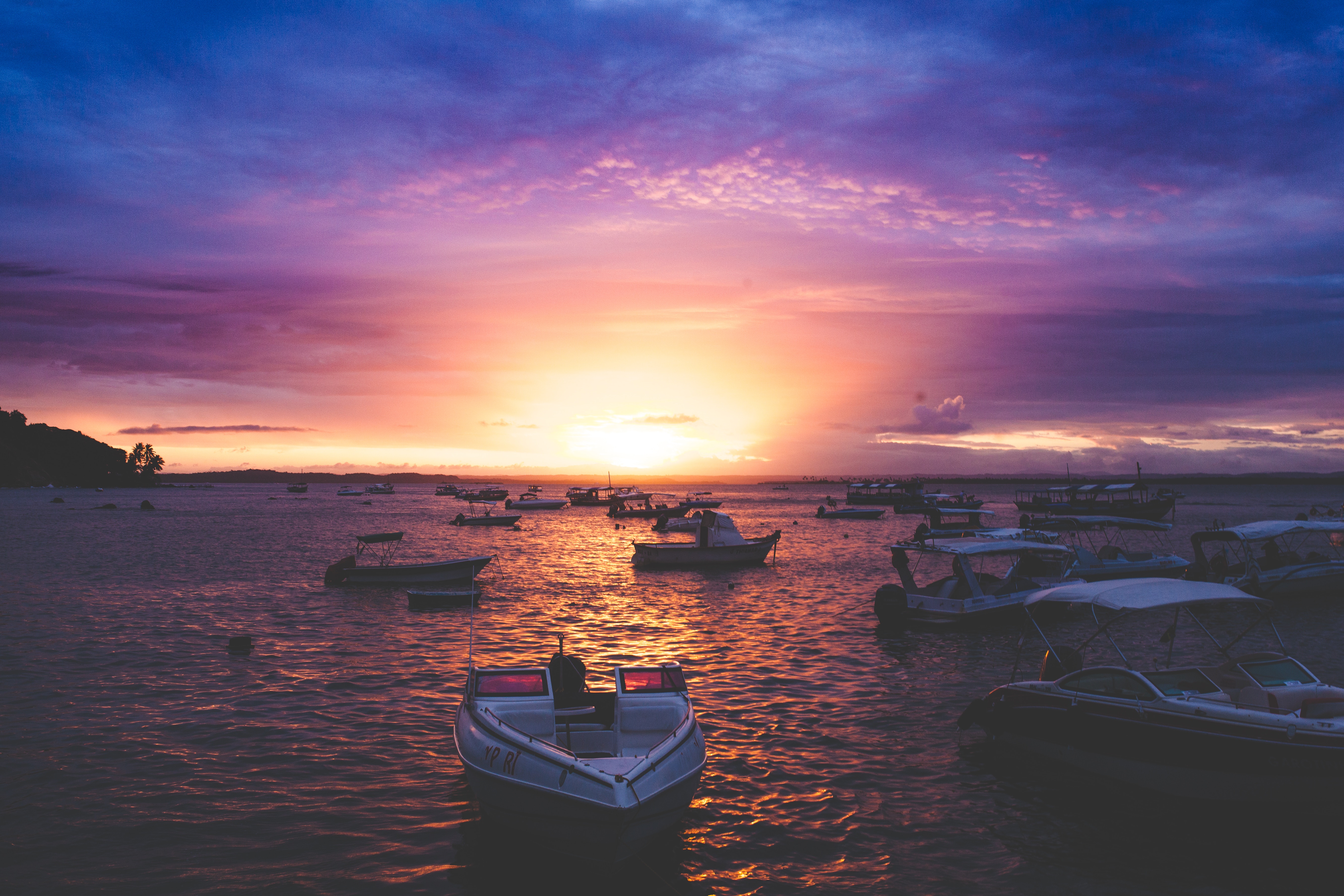 Boats on the water at sunset HD Wallpaper