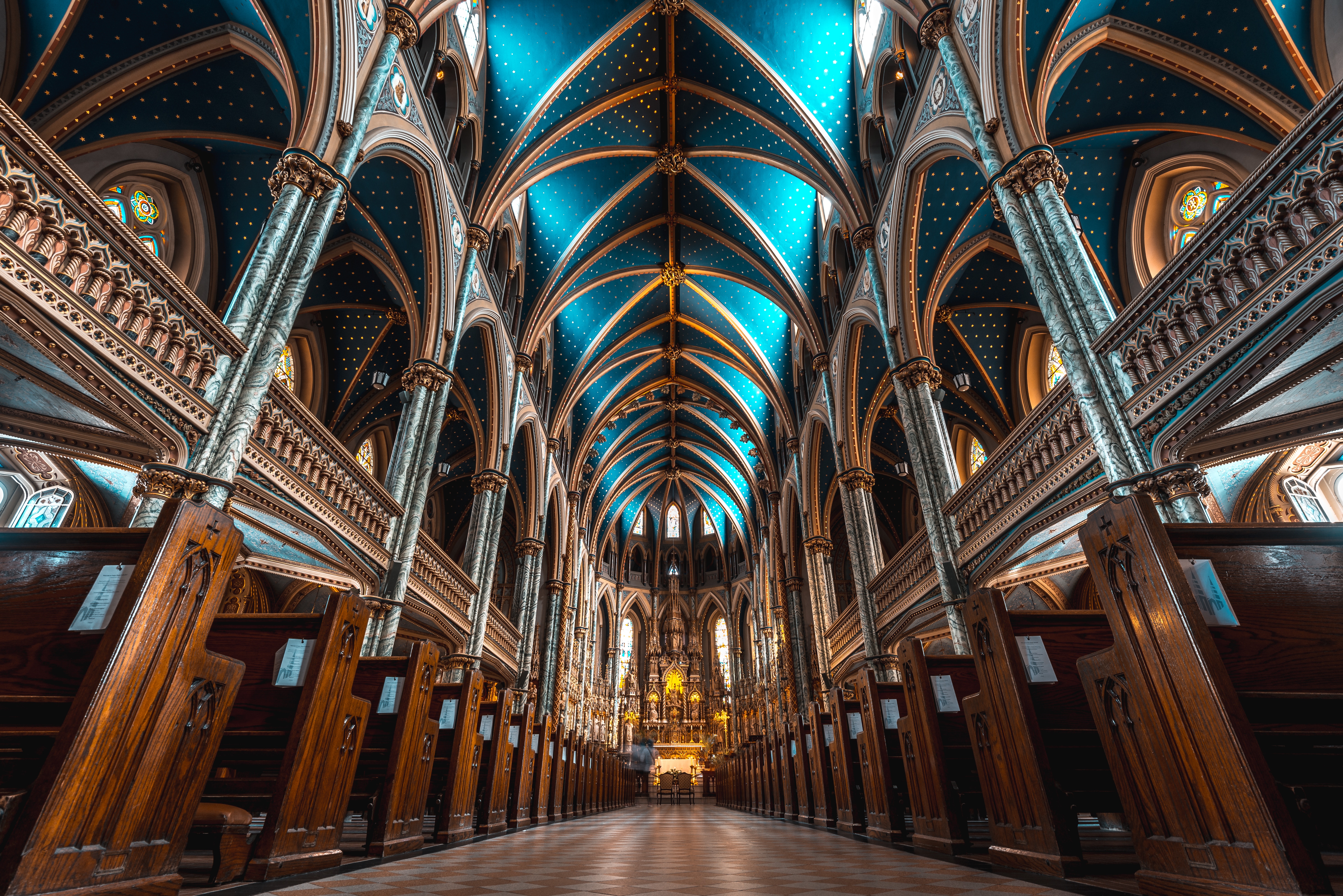 Interior of a grand church with a blue star-studded ceiling HD Wallpaper