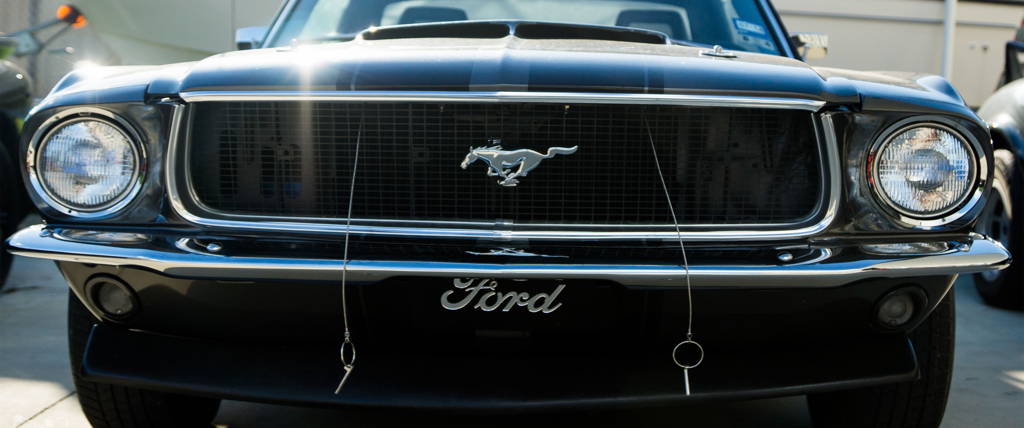1969 Ford Mustang front grille and headlights HD Wallpaper