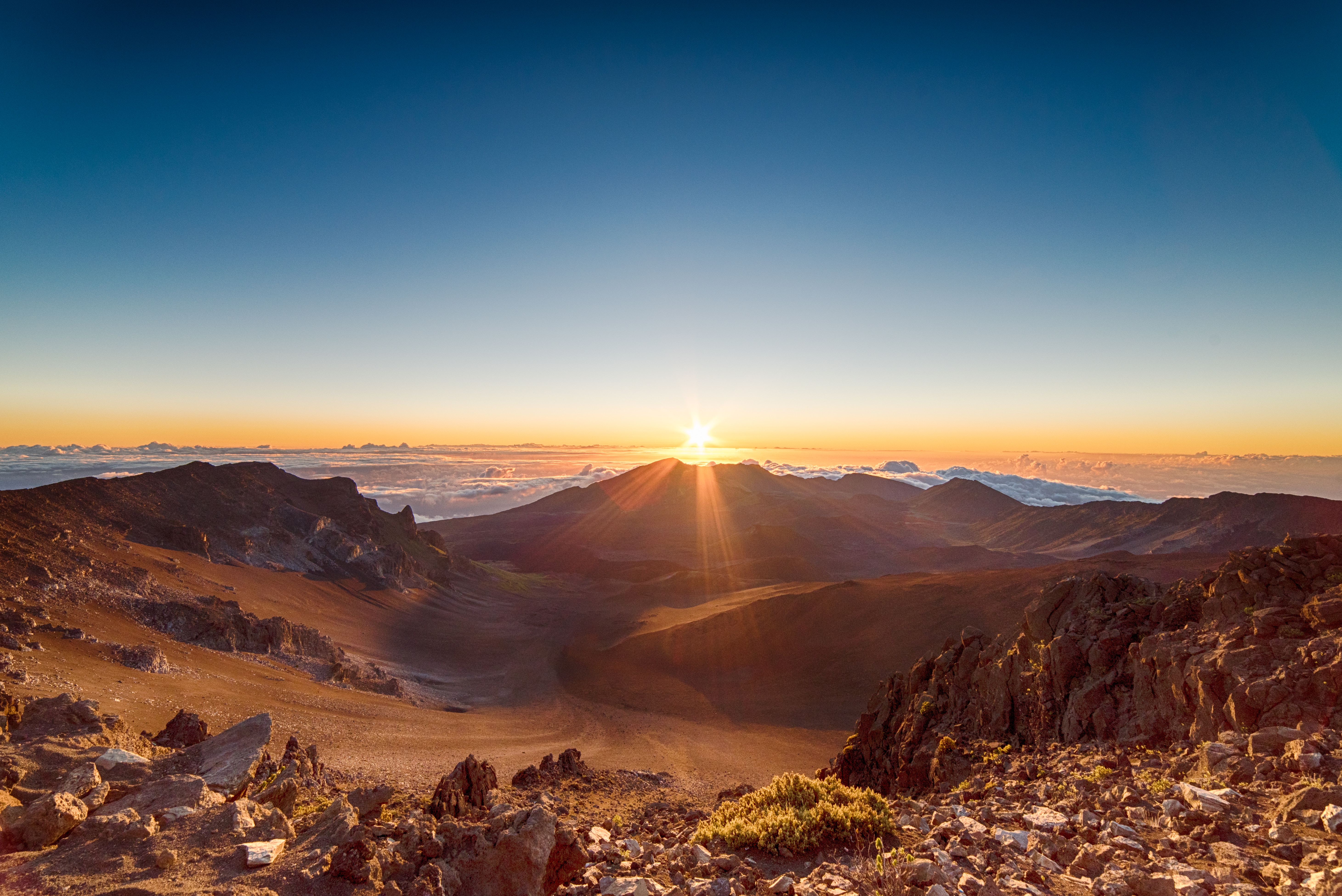Sunrise over a mountain valley with clouds HD Wallpaper