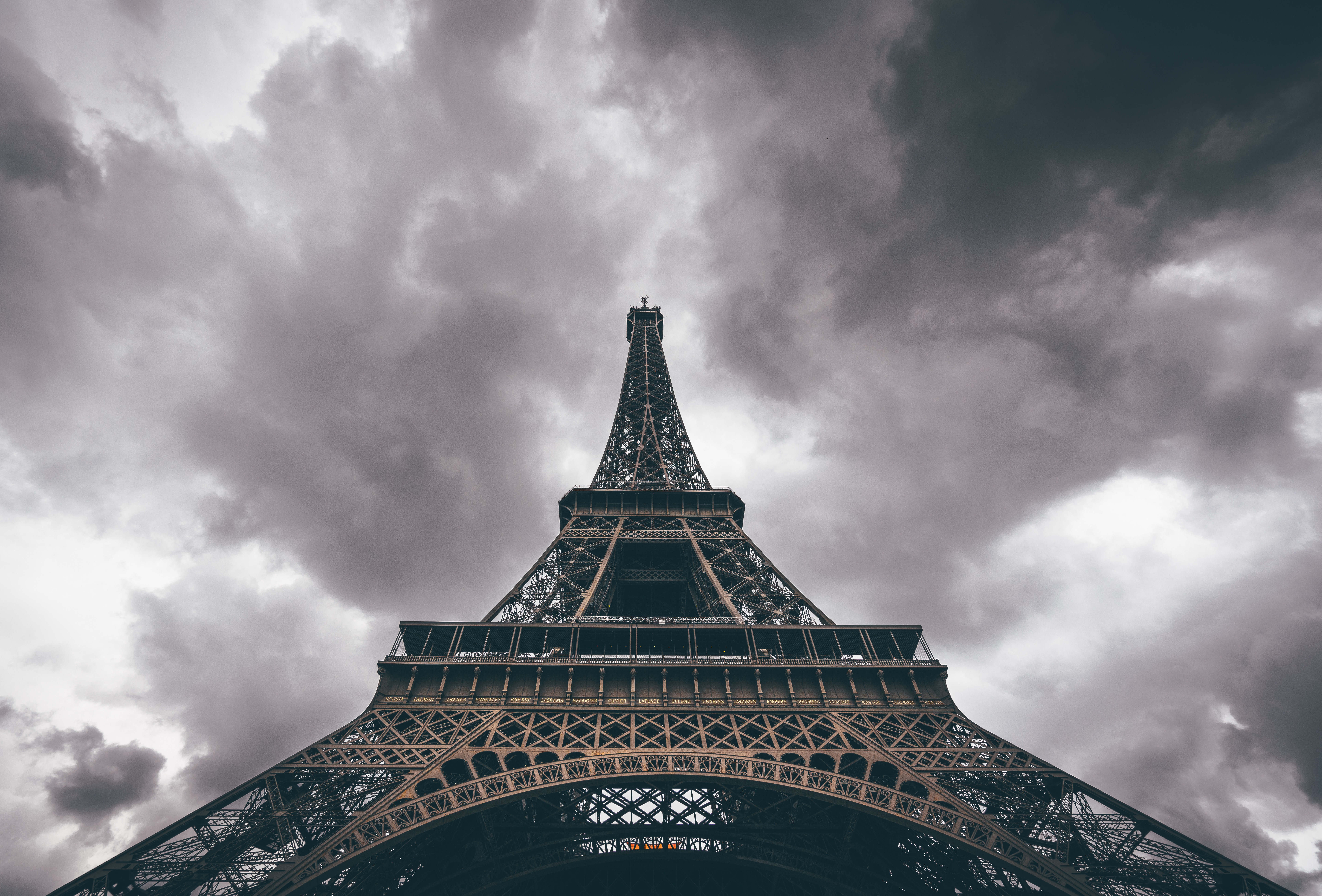 Eiffel Tower under a cloudy sky HD Wallpaper