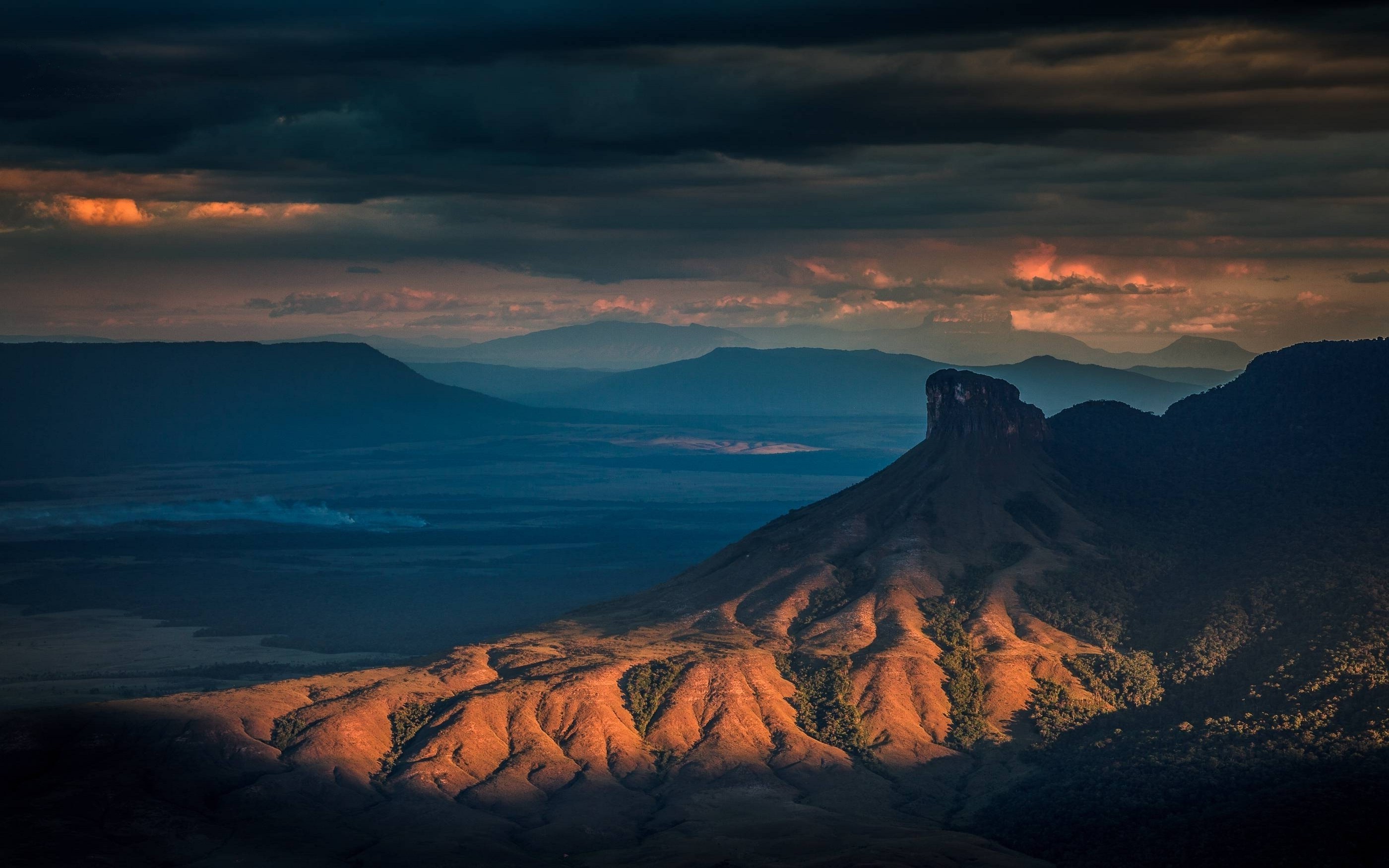 Sunset over a misty valley with a flat-topped mountain HD Wallpaper