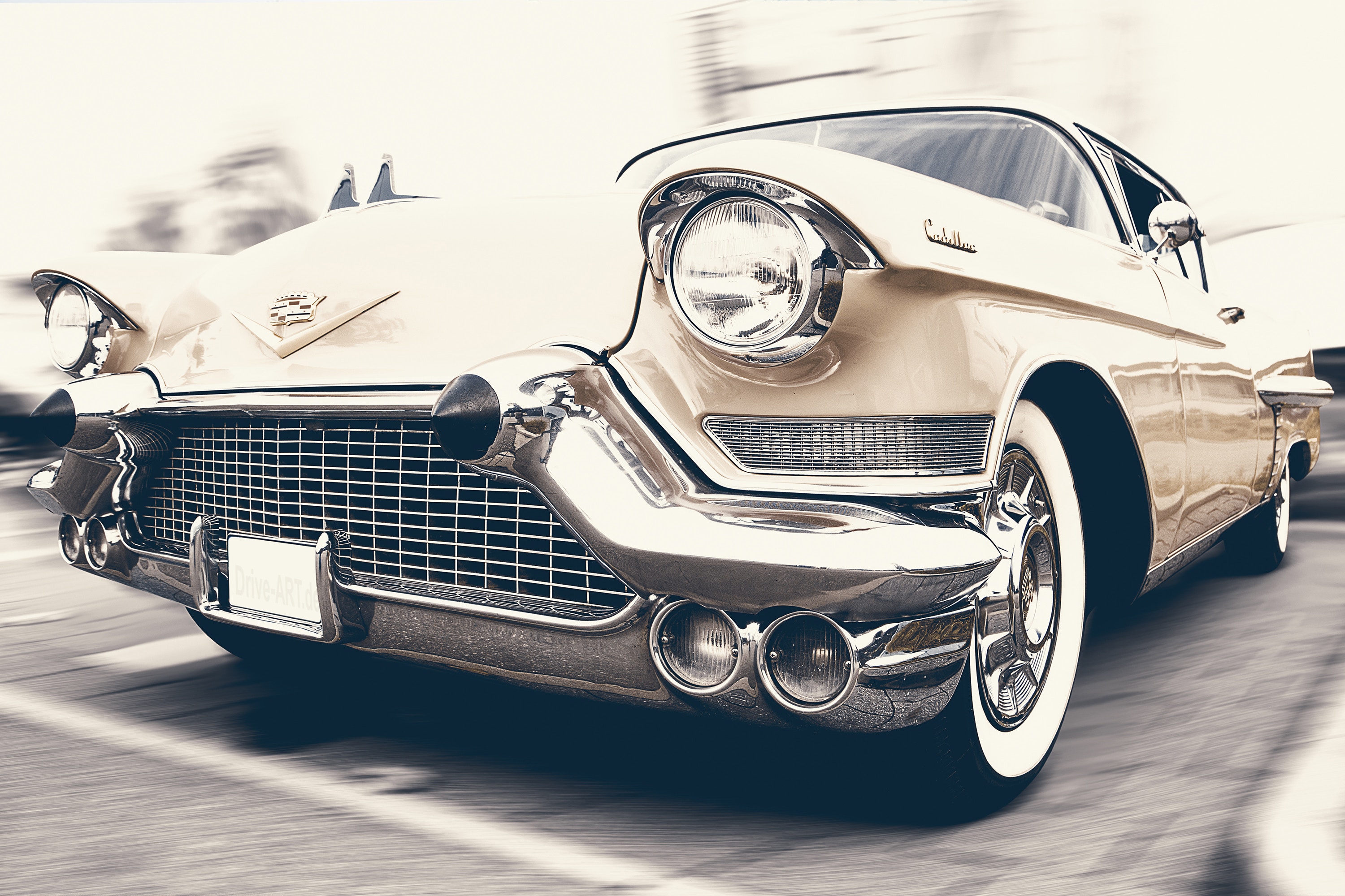 Vintage Cadillac car in motion on a road HD Wallpaper