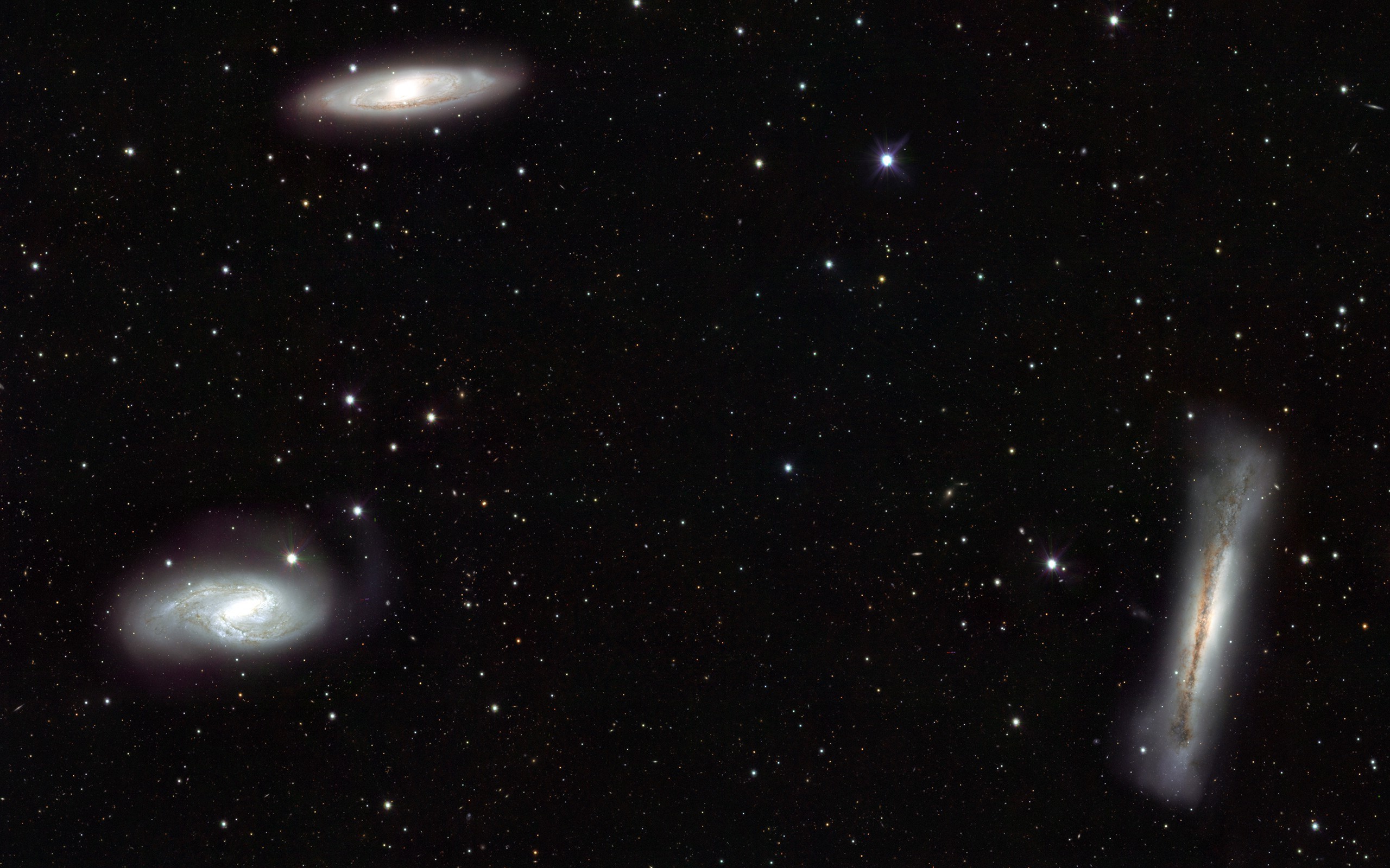 Four galaxies in deep space with stars HD Wallpaper