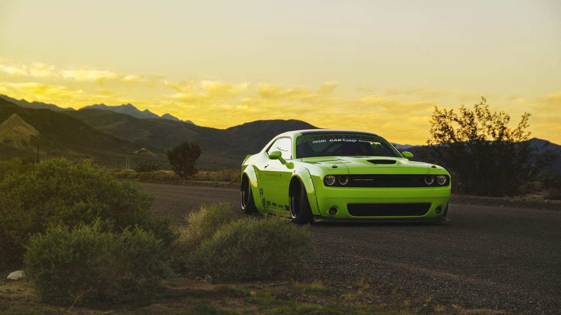 Green Dodge Challenger Widebody on a Desert Road at Sunset HD Wallpaper