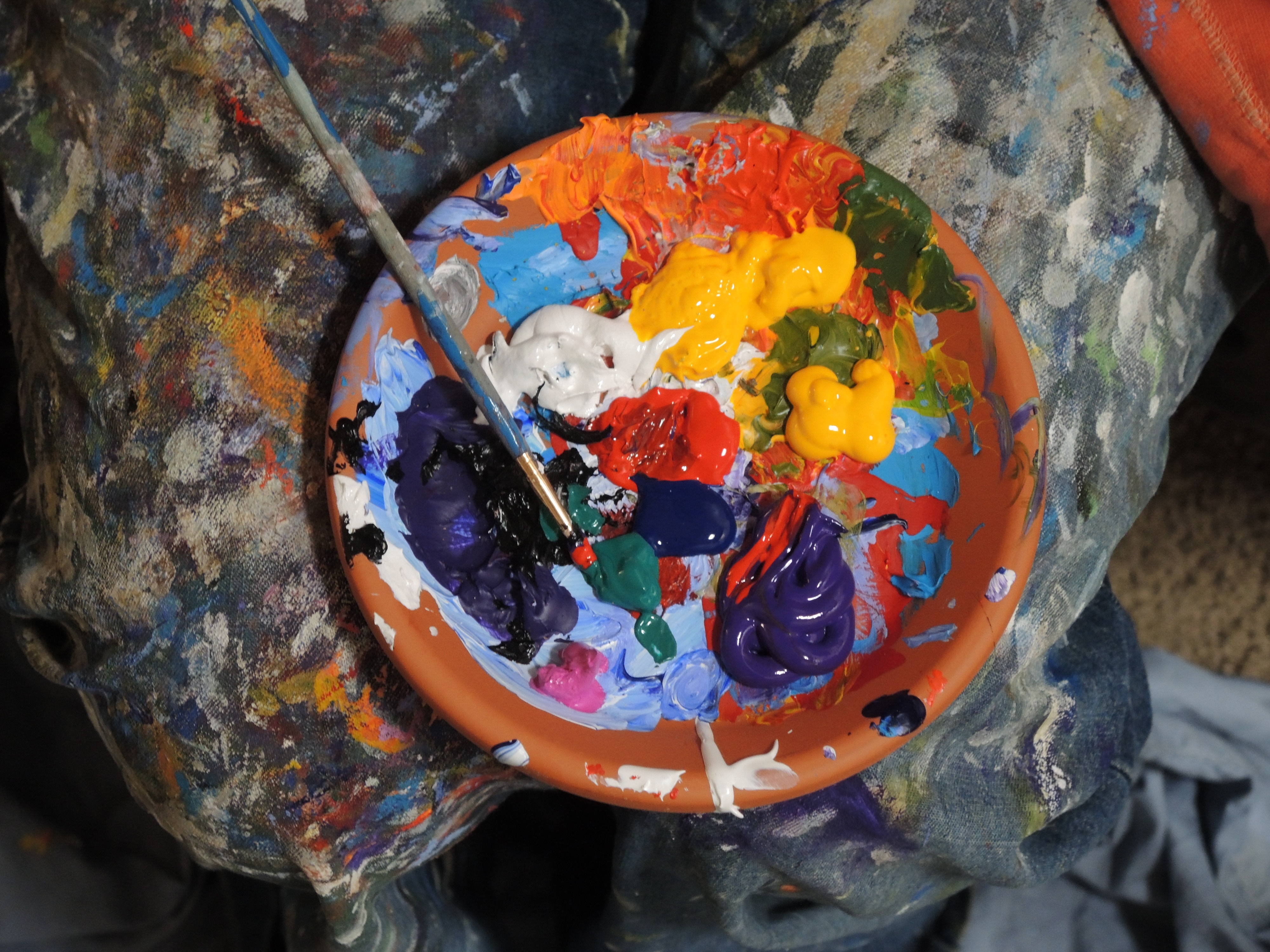 Artist's paint palette with brush and colorful paints HD Wallpaper