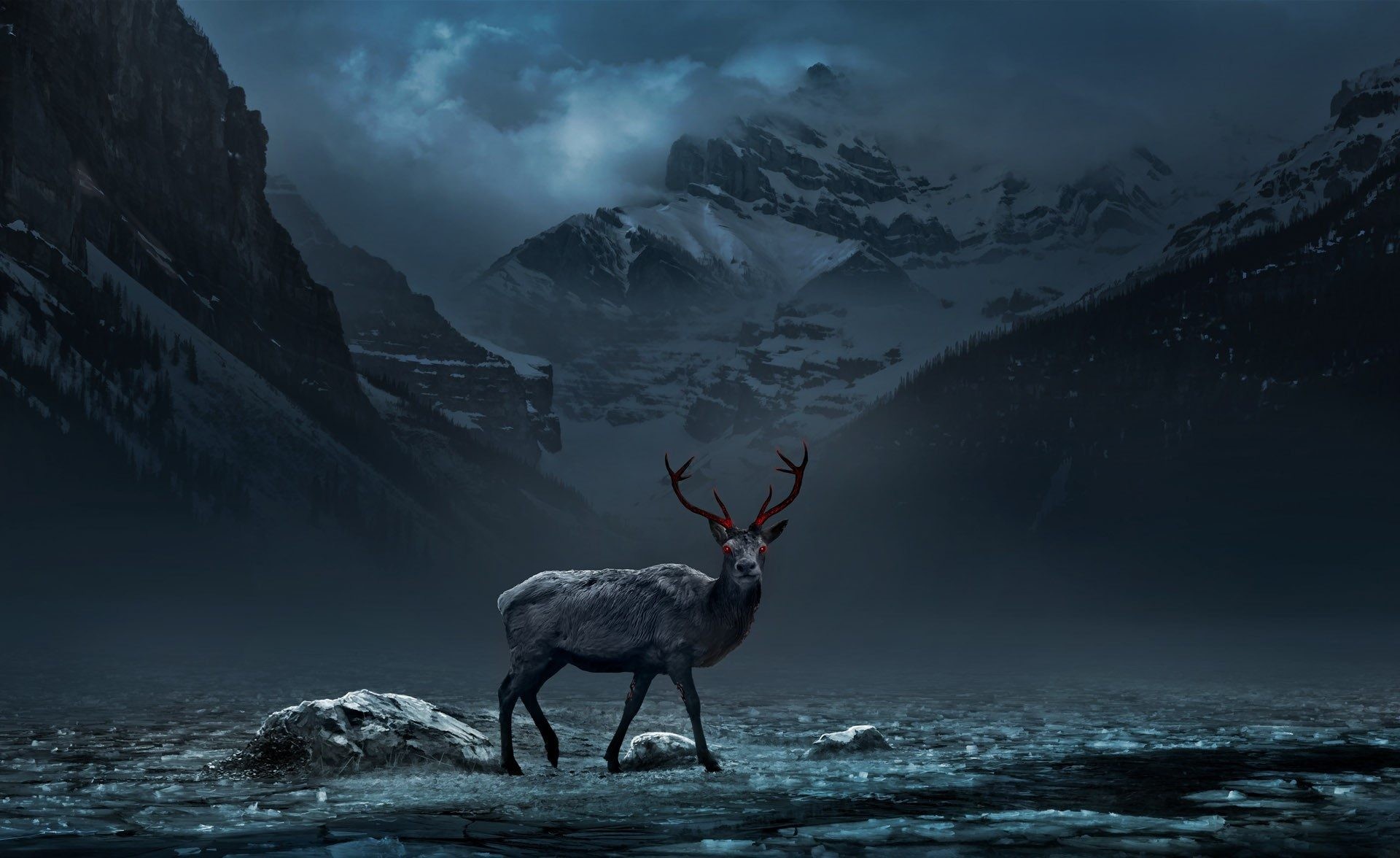 Deer with red eyes in a snowy mountain landscape HD Wallpaper