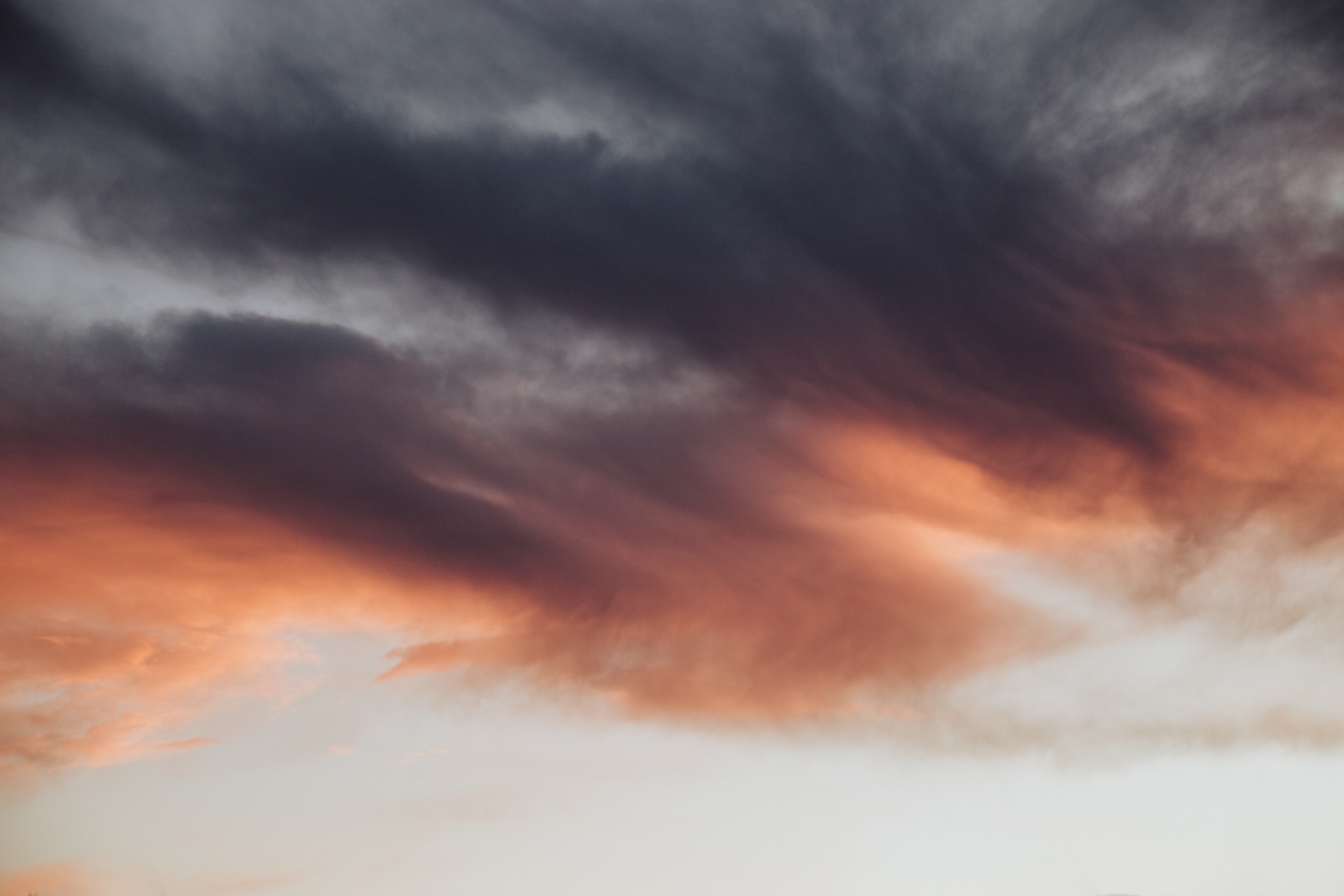 Dark and orange clouds at sunset HD Wallpaper