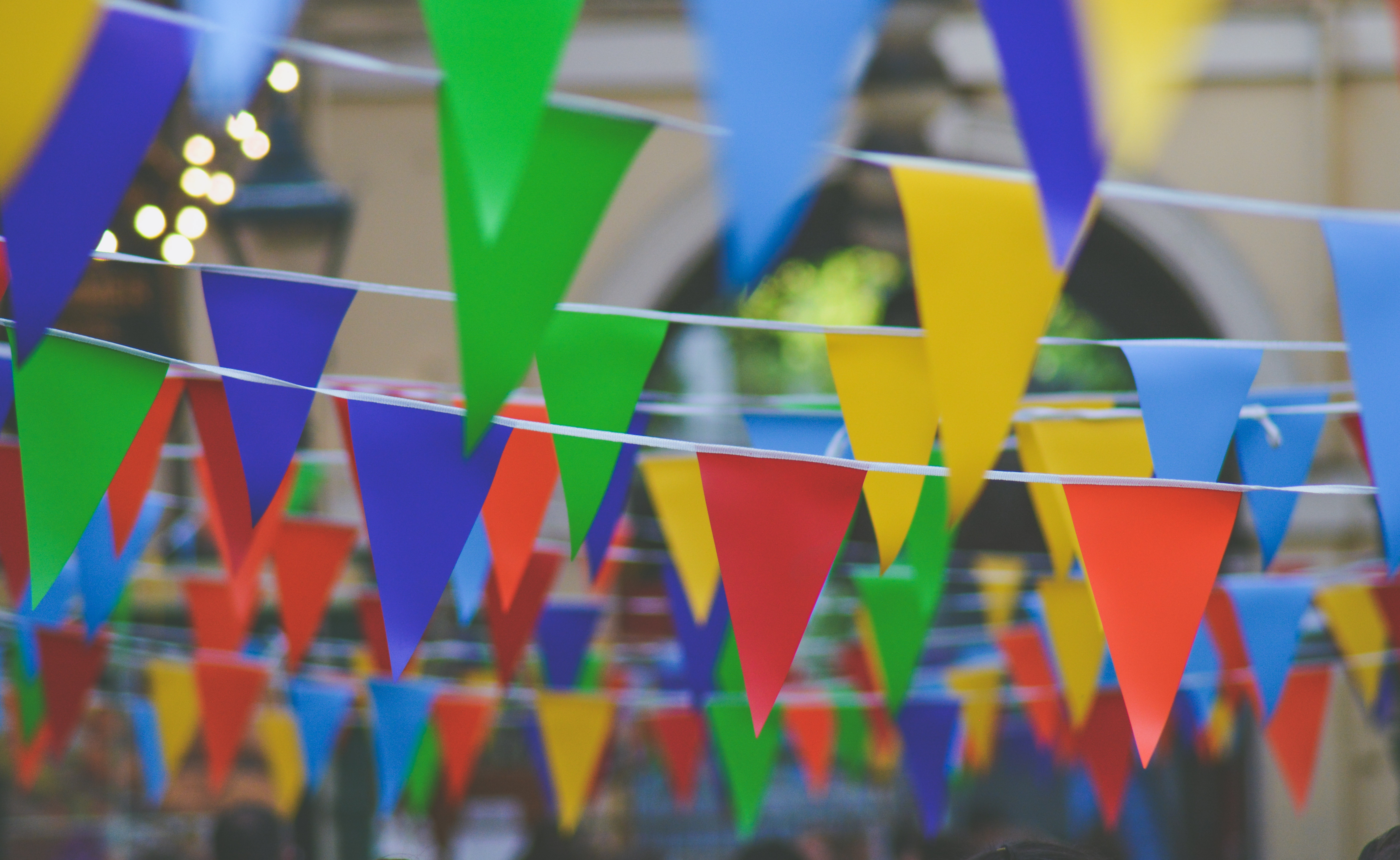 Colorful Bunting Flags Hanging Outdoors HD Wallpaper