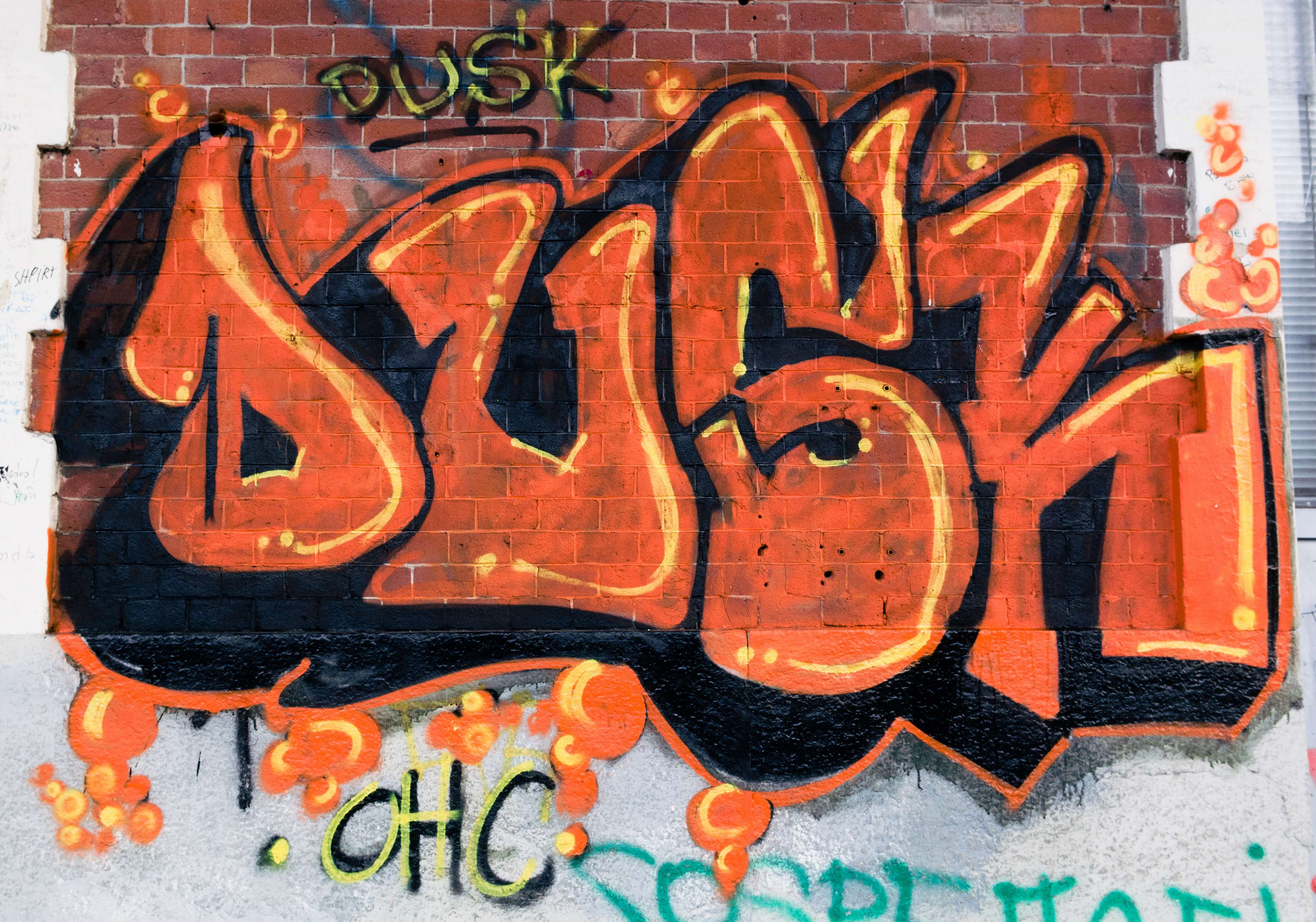 Graffiti art on a brick wall HD Wallpaper