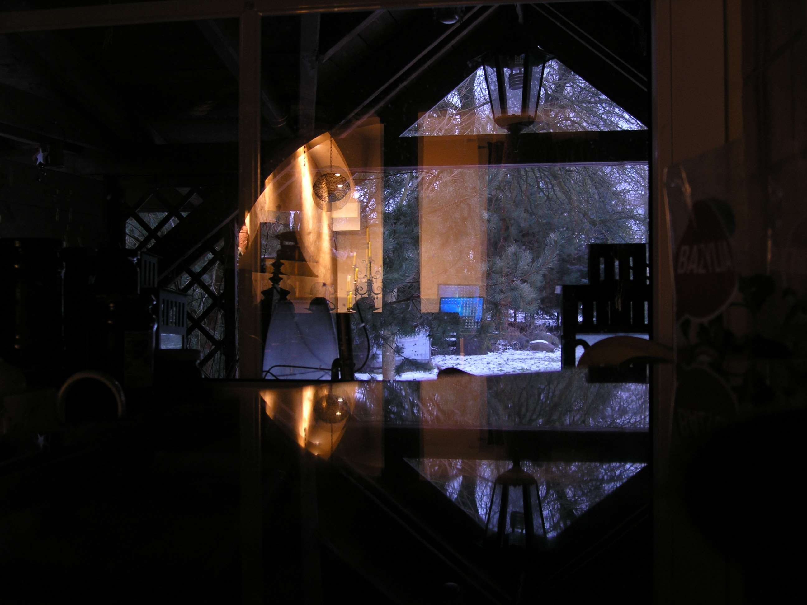 Reflection of a winter scene through a window HD Wallpaper