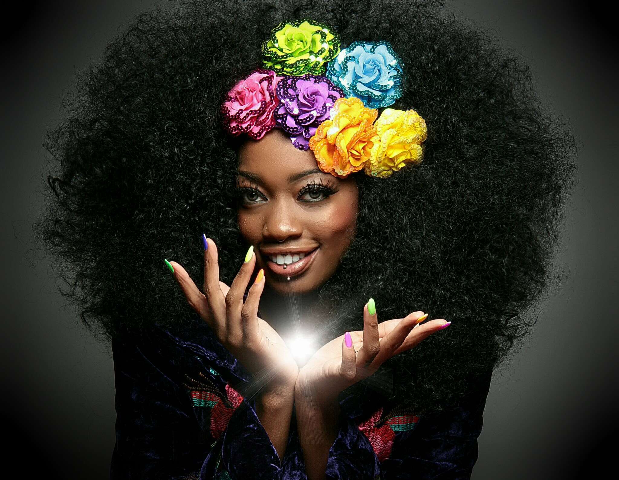 Woman with large afro and flower crown HD Wallpaper