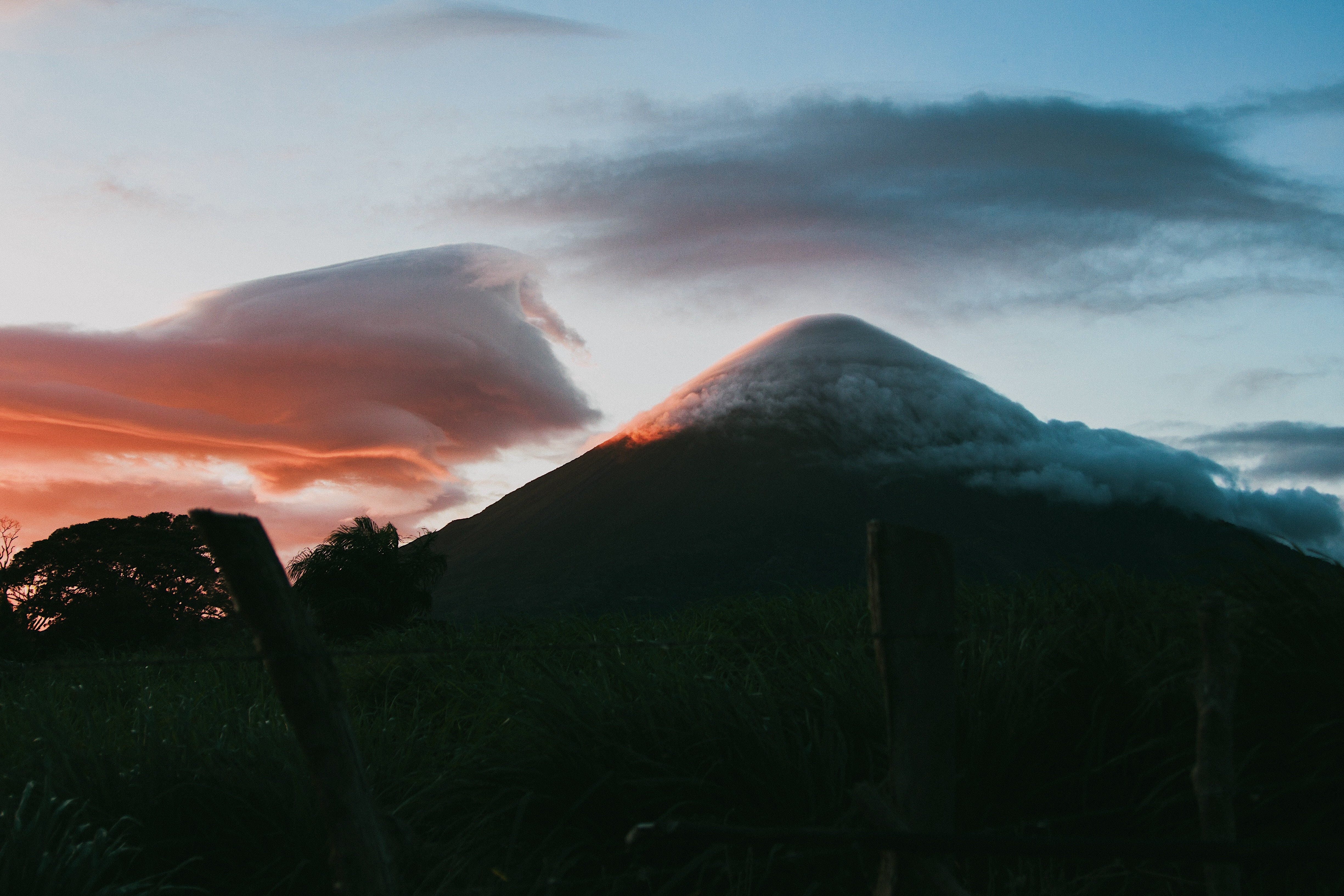 Volcano peak with sunset clouds over Ometepe HD Wallpaper