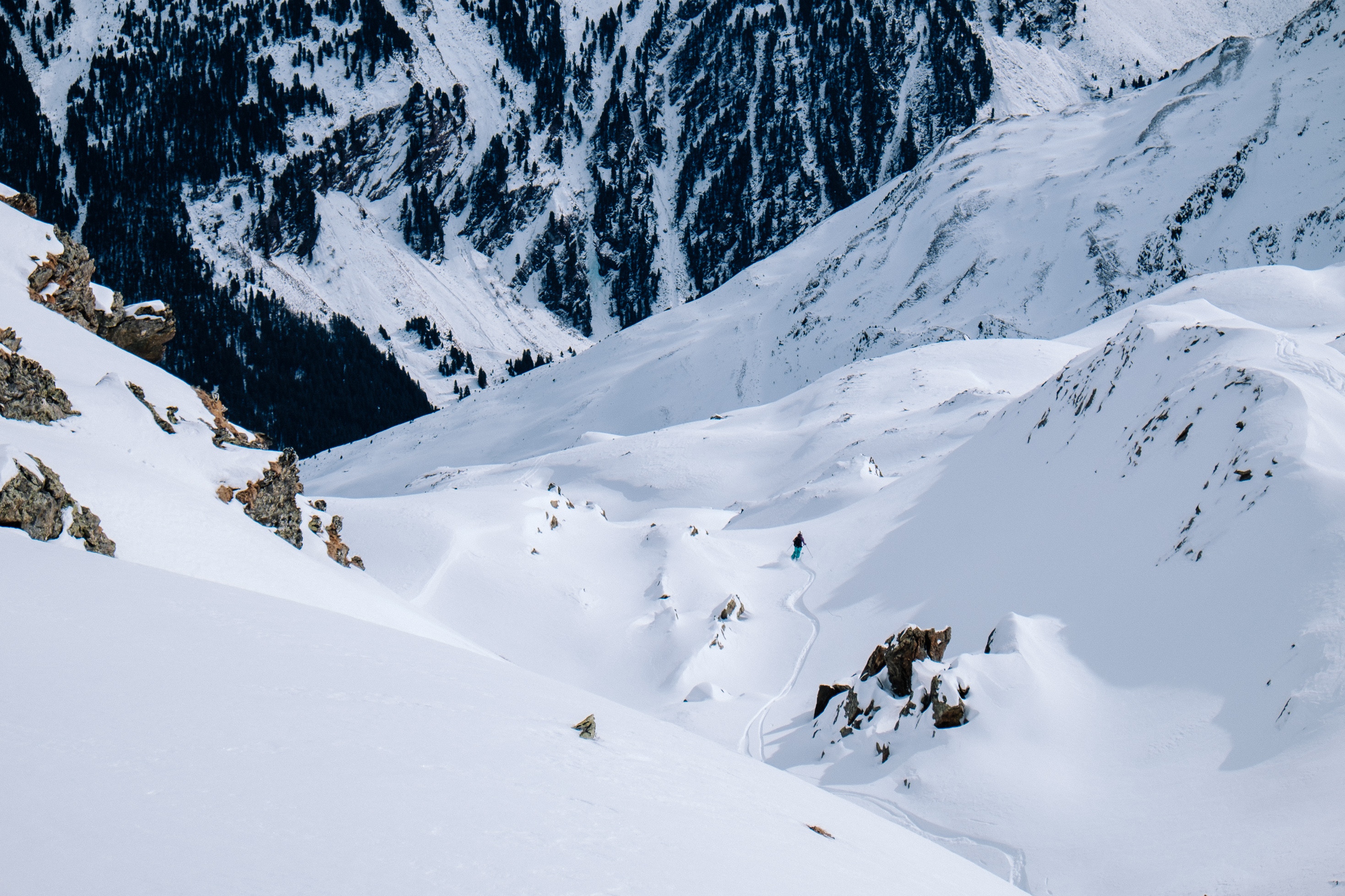 Skier on a snowy mountain in Tirol, Austria HD Wallpaper