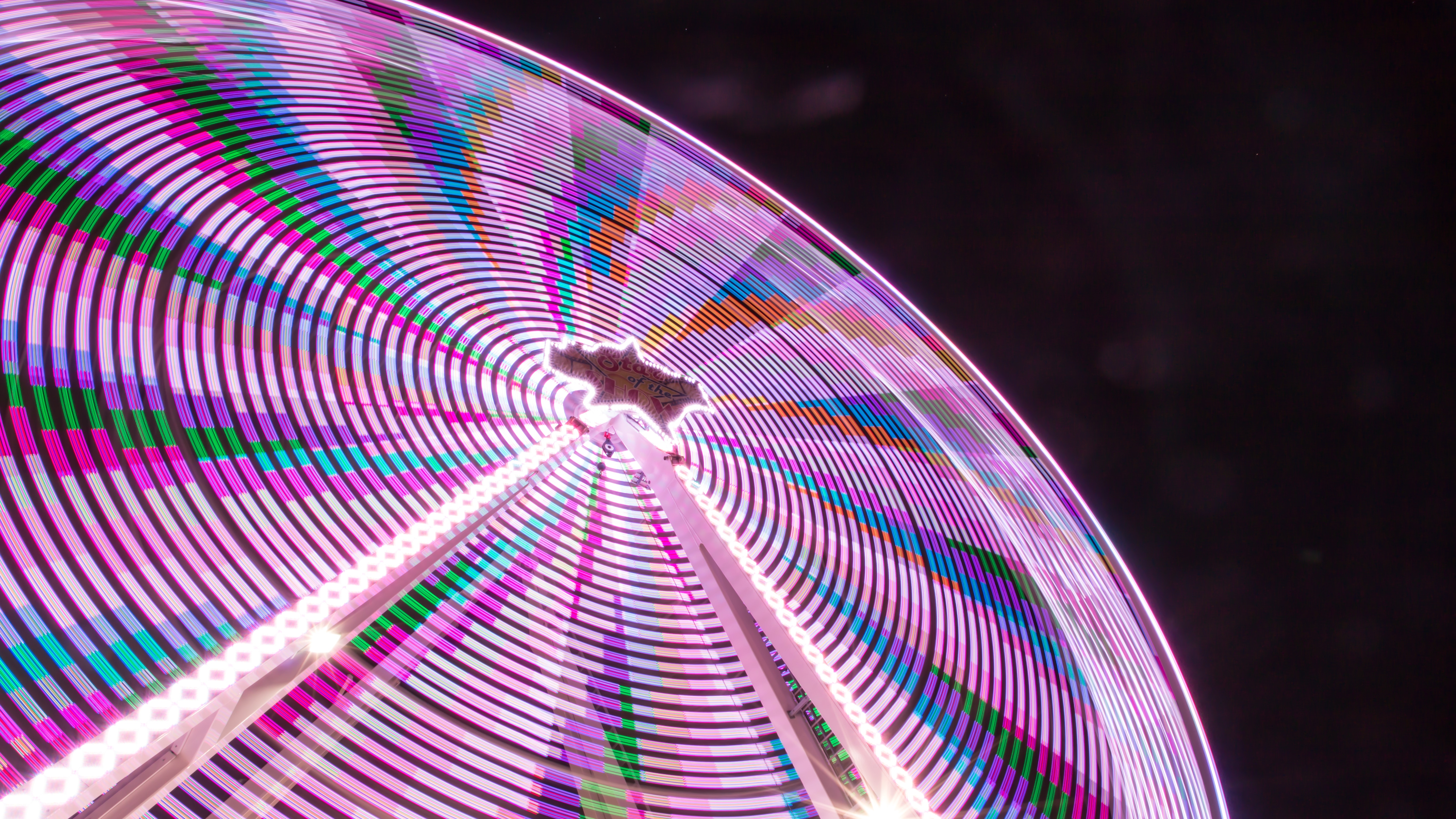 Ferris wheel with colorful lights at night HD Wallpaper