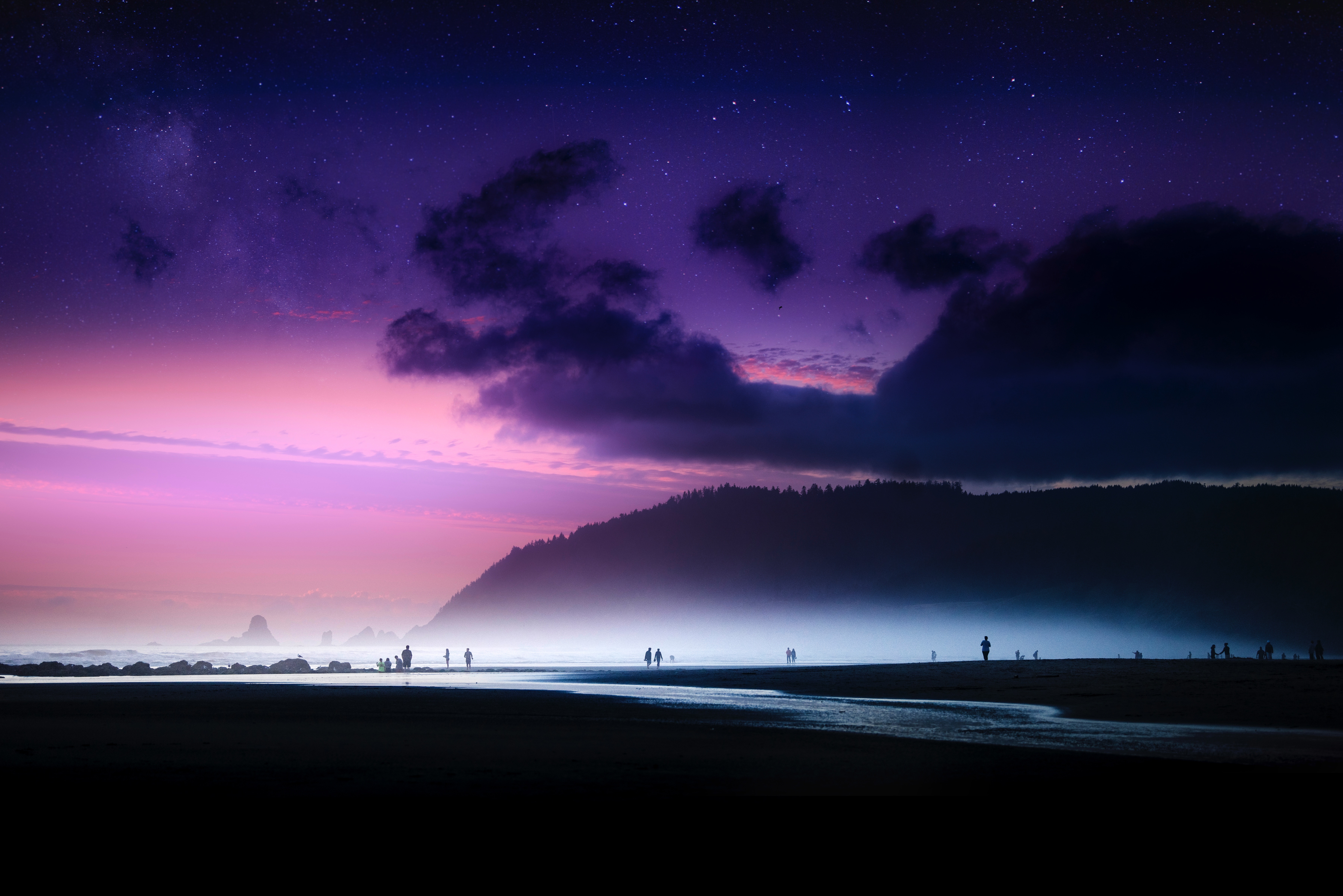 People on a beach at dusk with stars and purple sky HD Wallpaper