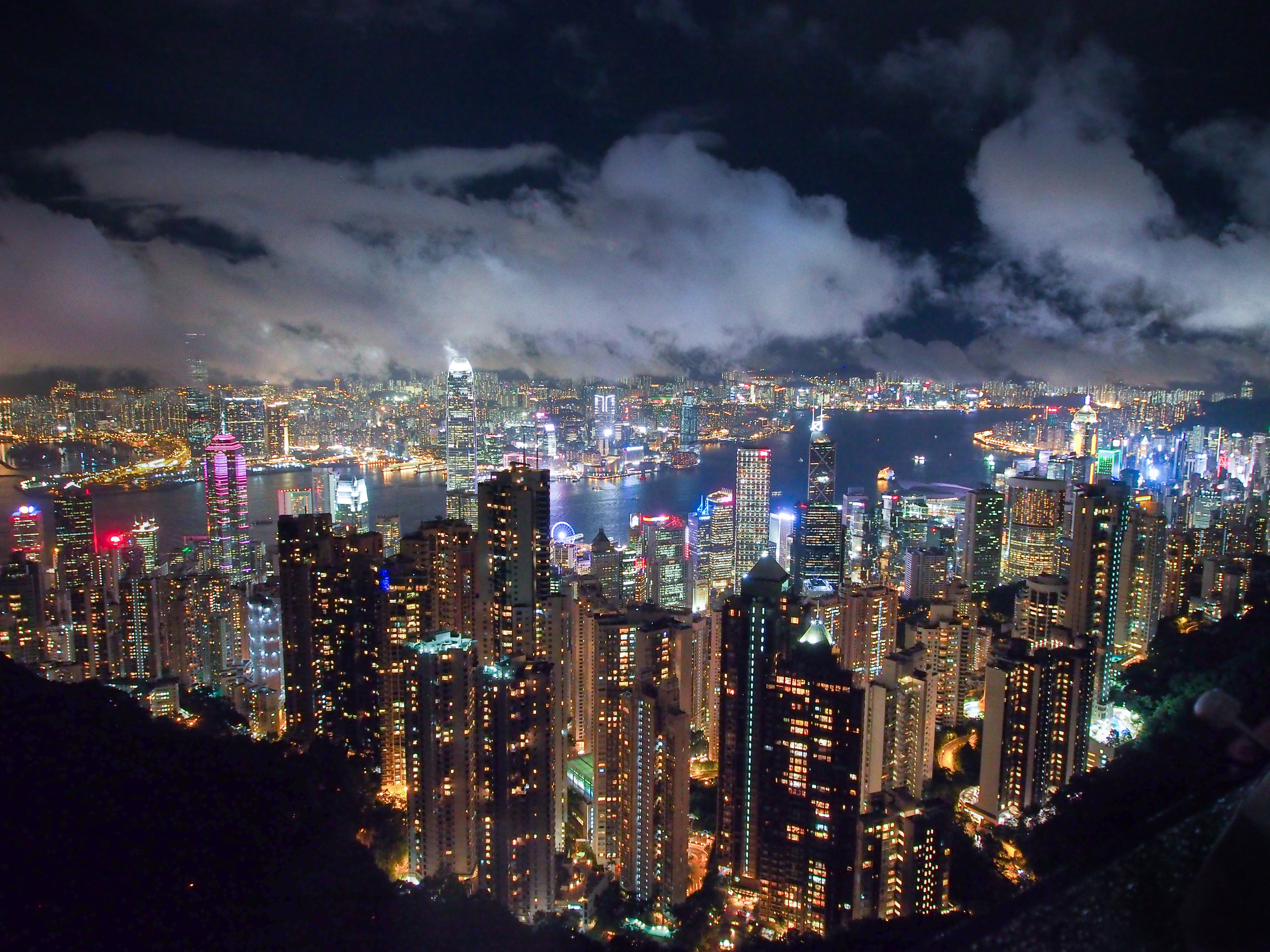 Hong Kong skyline at night with clouds HD Wallpaper