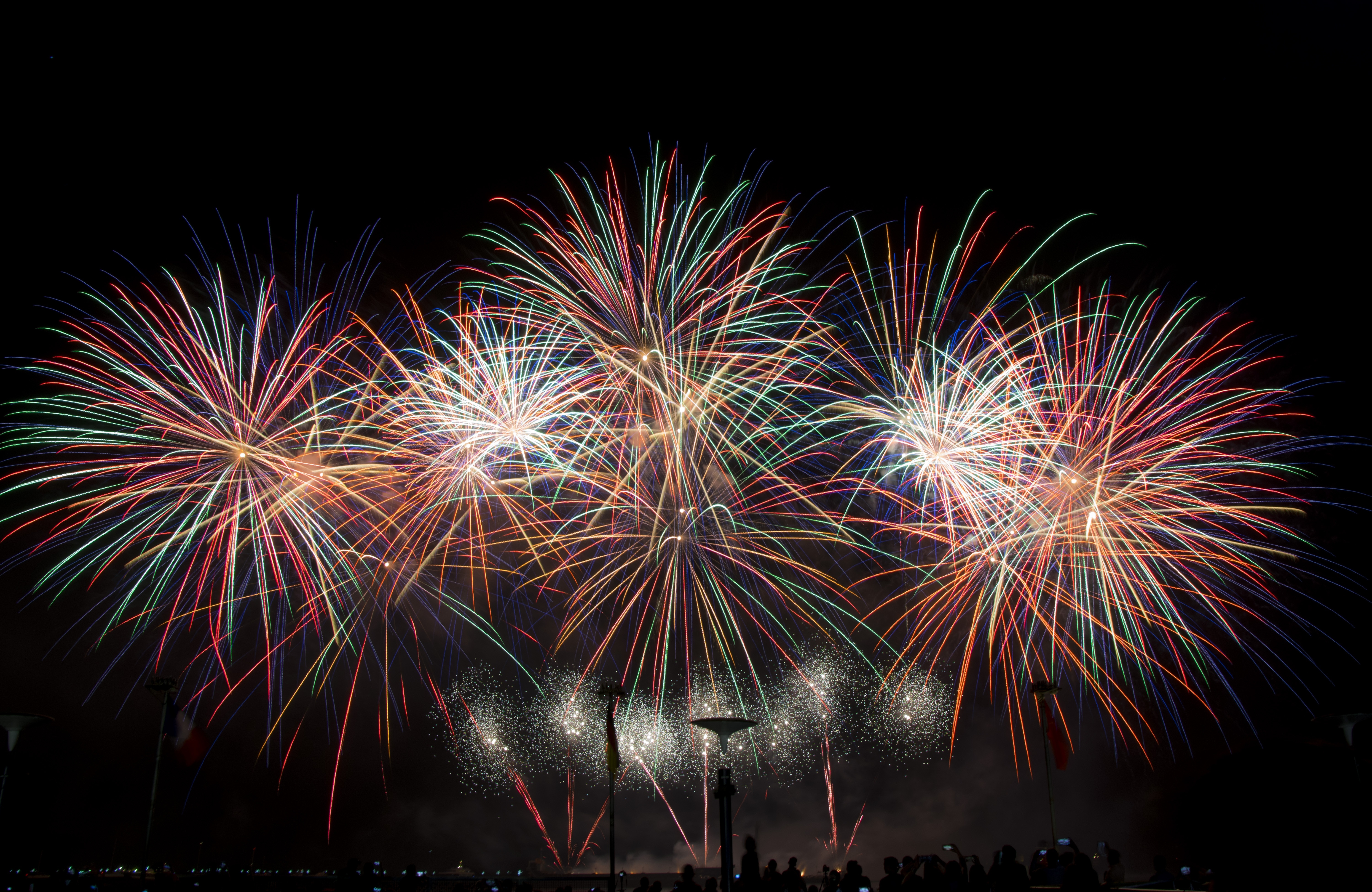 Colorful fireworks explode in the night sky HD Wallpaper