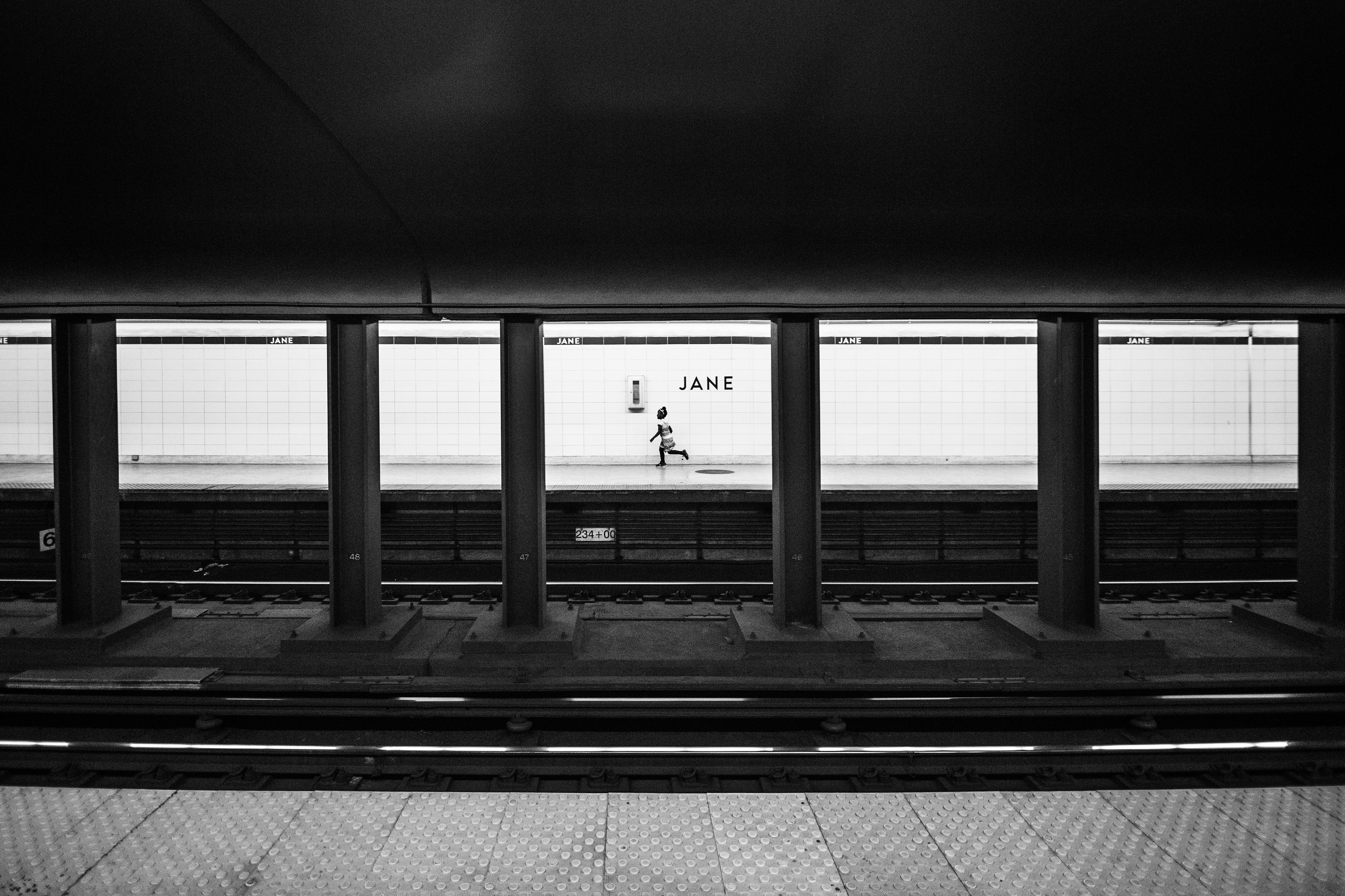 Girl running at Jane subway station HD Wallpaper