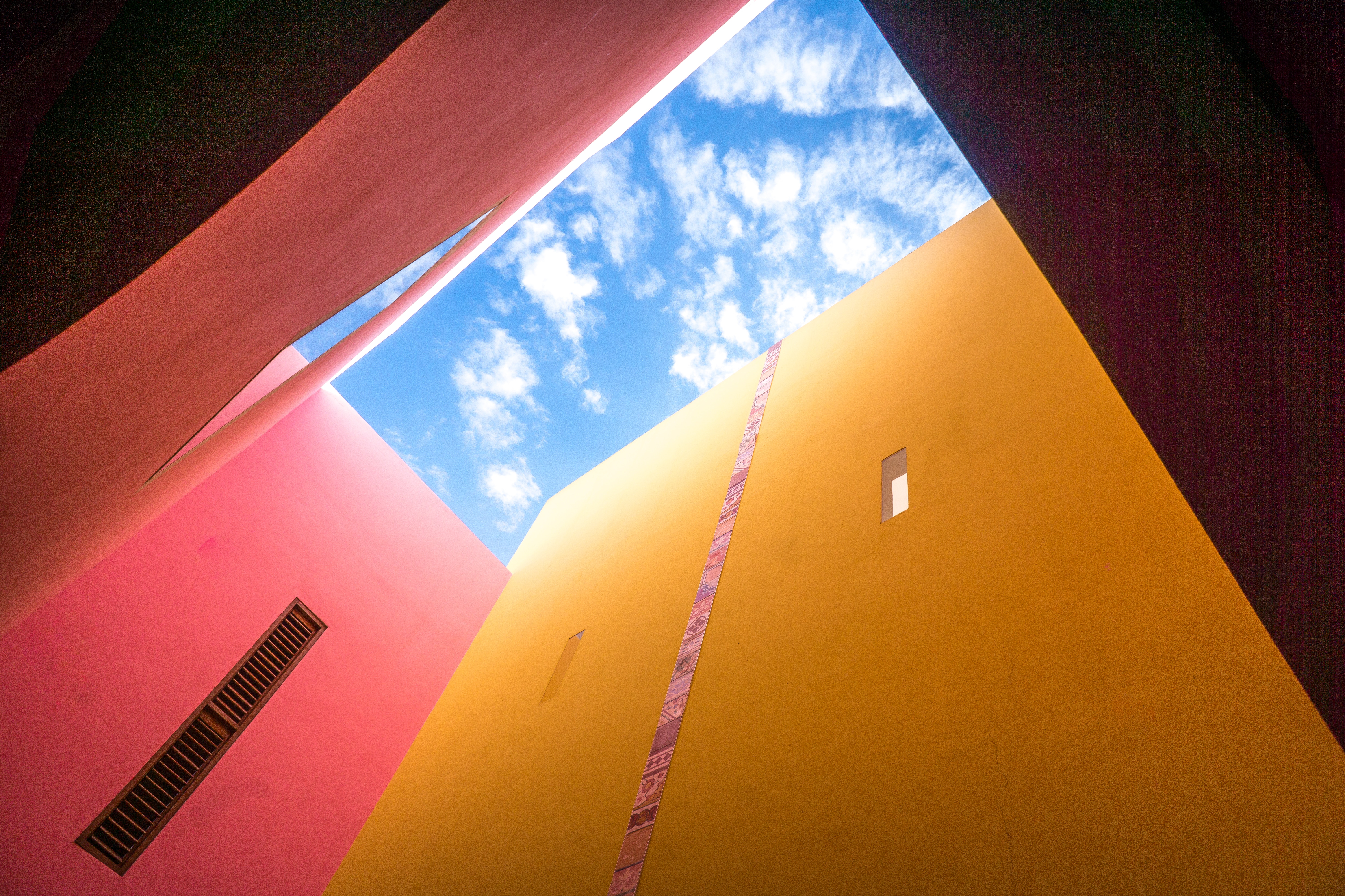 Colorful buildings looking up at the sky HD Wallpaper