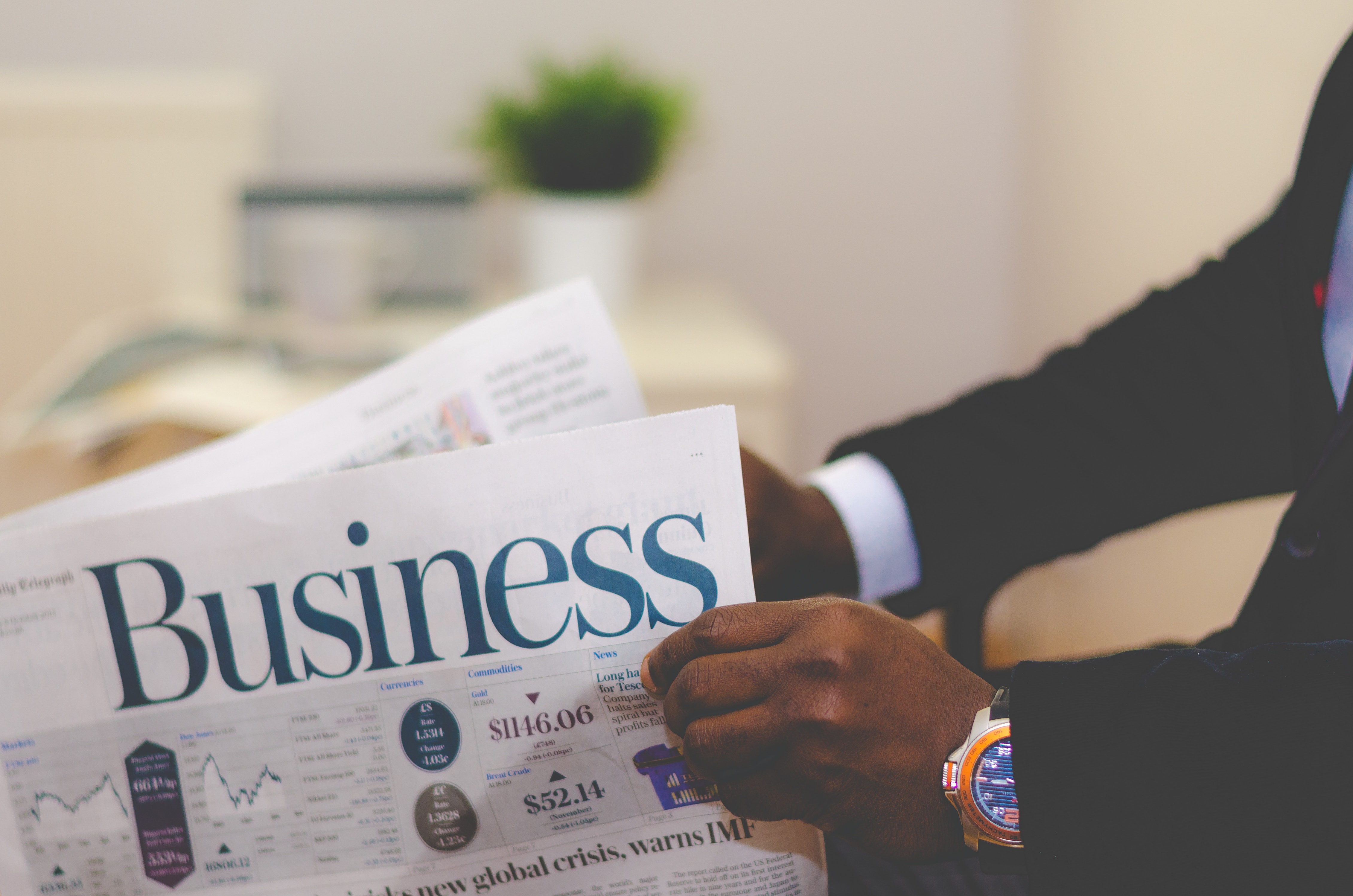 Man in Suit Reading Business Newspaper HD Wallpaper