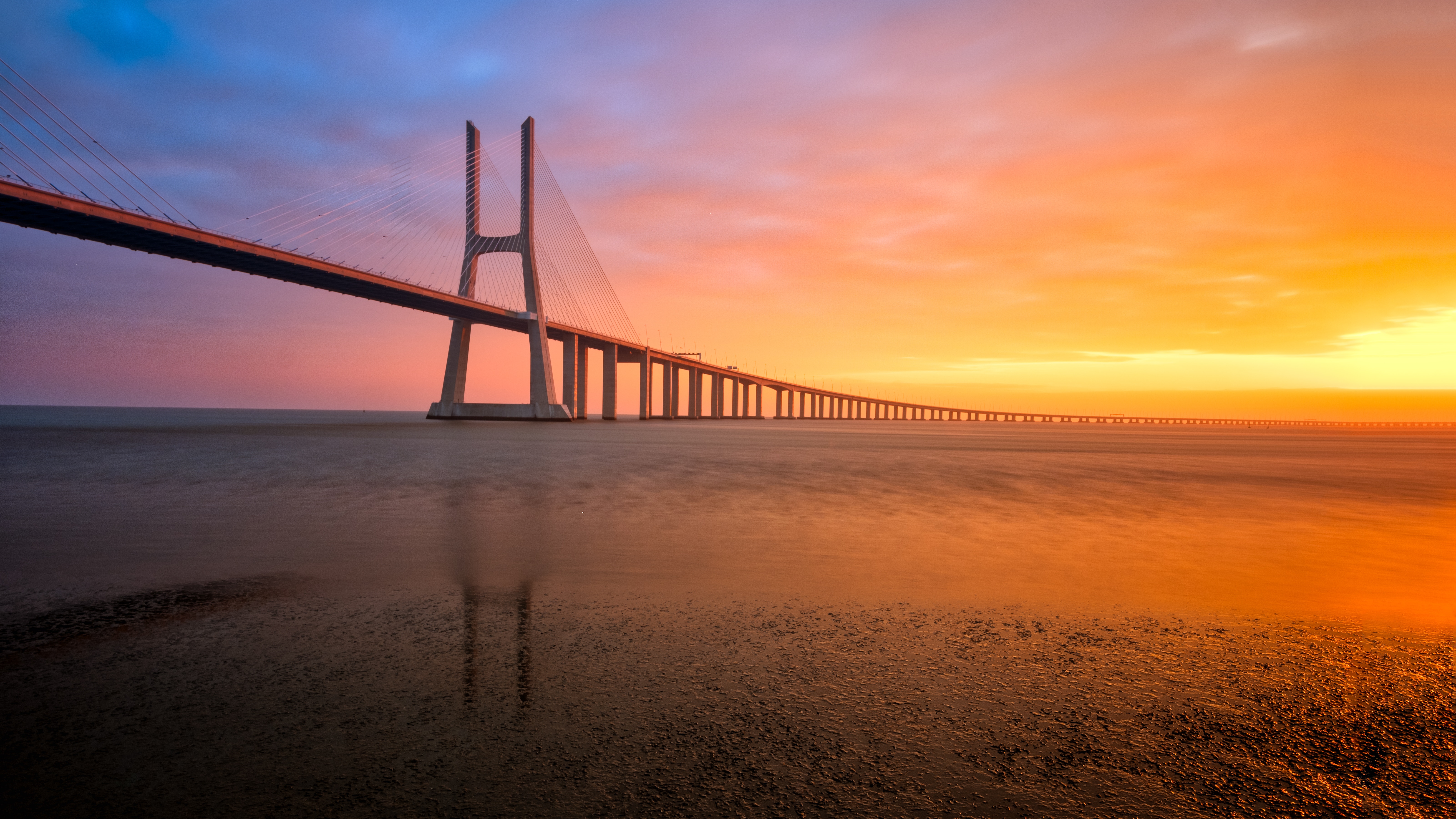 Sunset Over Portugal Bridge in 4K HD Wallpaper