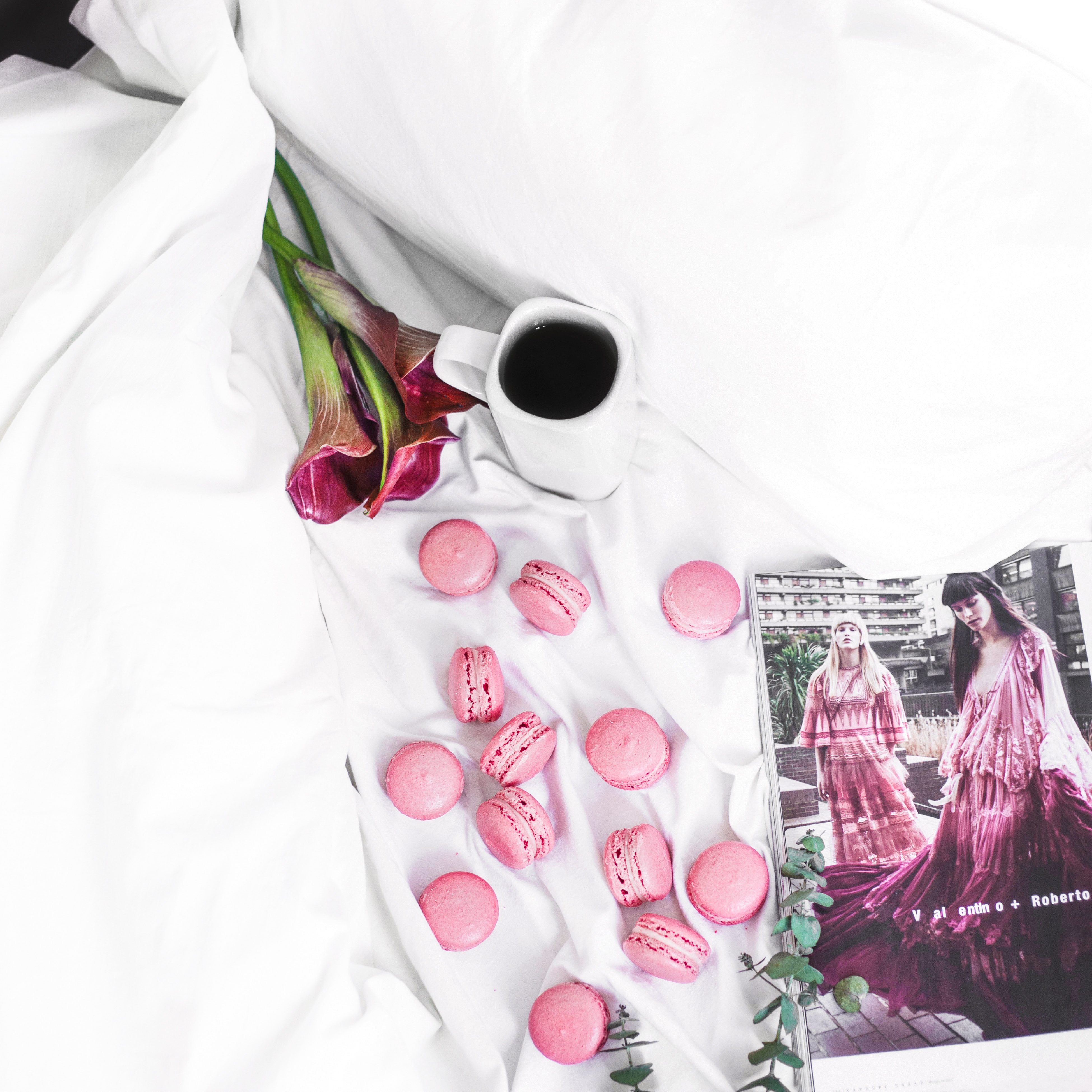 Pink Macarons and Coffee on a White Bedding HD Wallpaper